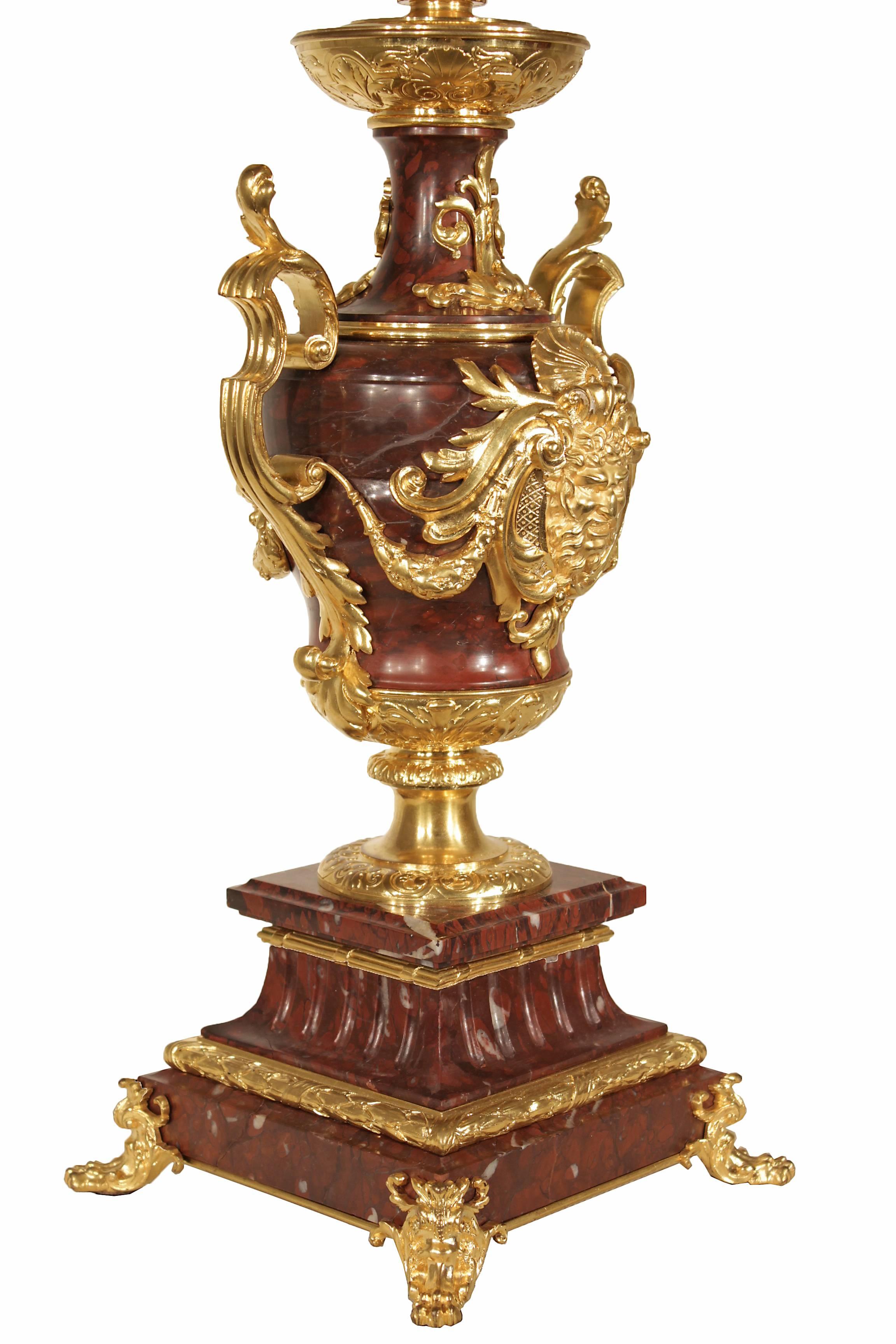 A superb quality and impressive large-scale pair of French, 19th century Renaissance st. Rouge Griotte and ormolu nine arm candelabras, signed F. Barbedienne. Each candelabrum is raised by a square Rouge Griotte marble base with an ormolu ‘C’