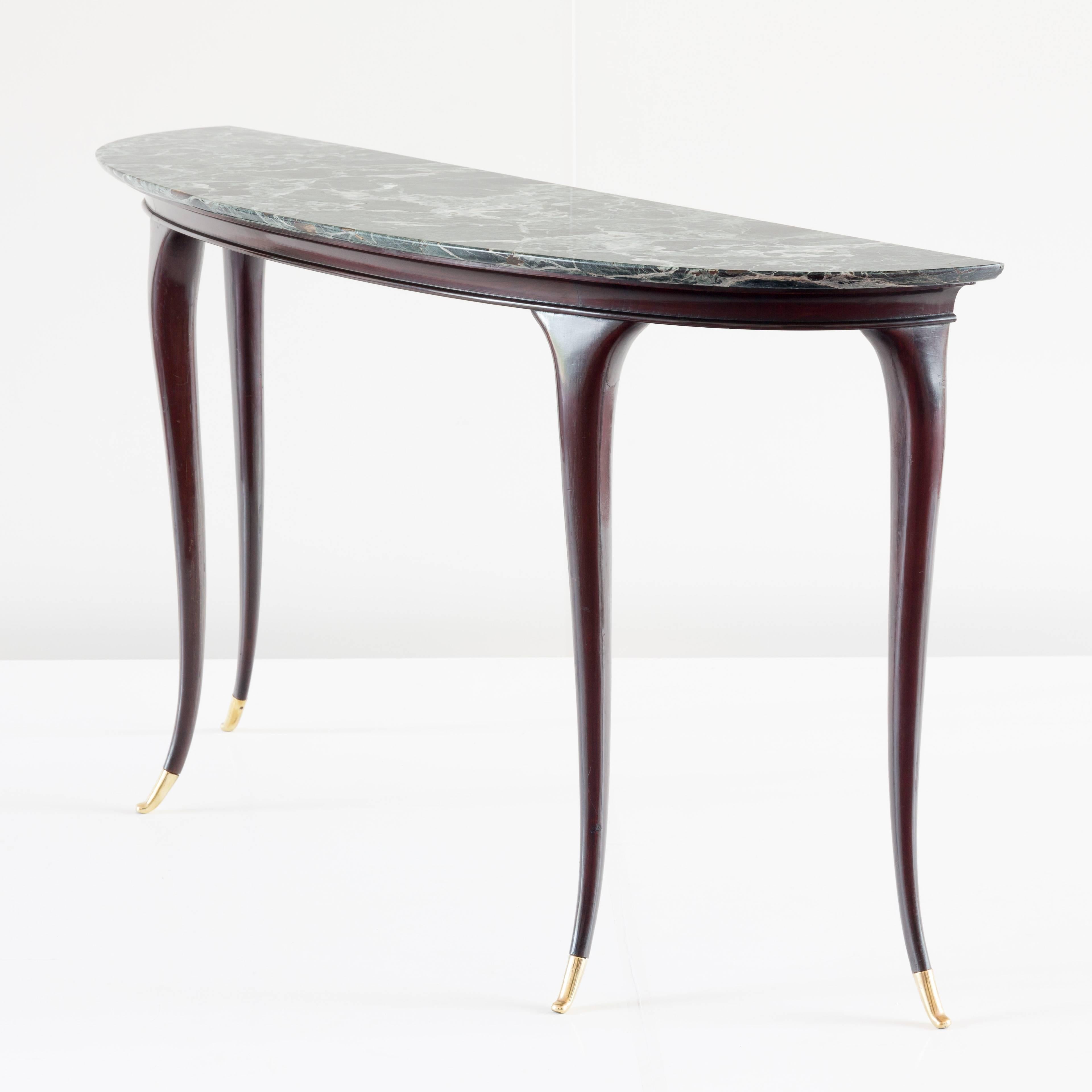 Important rare console table designed by Guglielmo Ulrich, 1950.

Mahogany, brass,