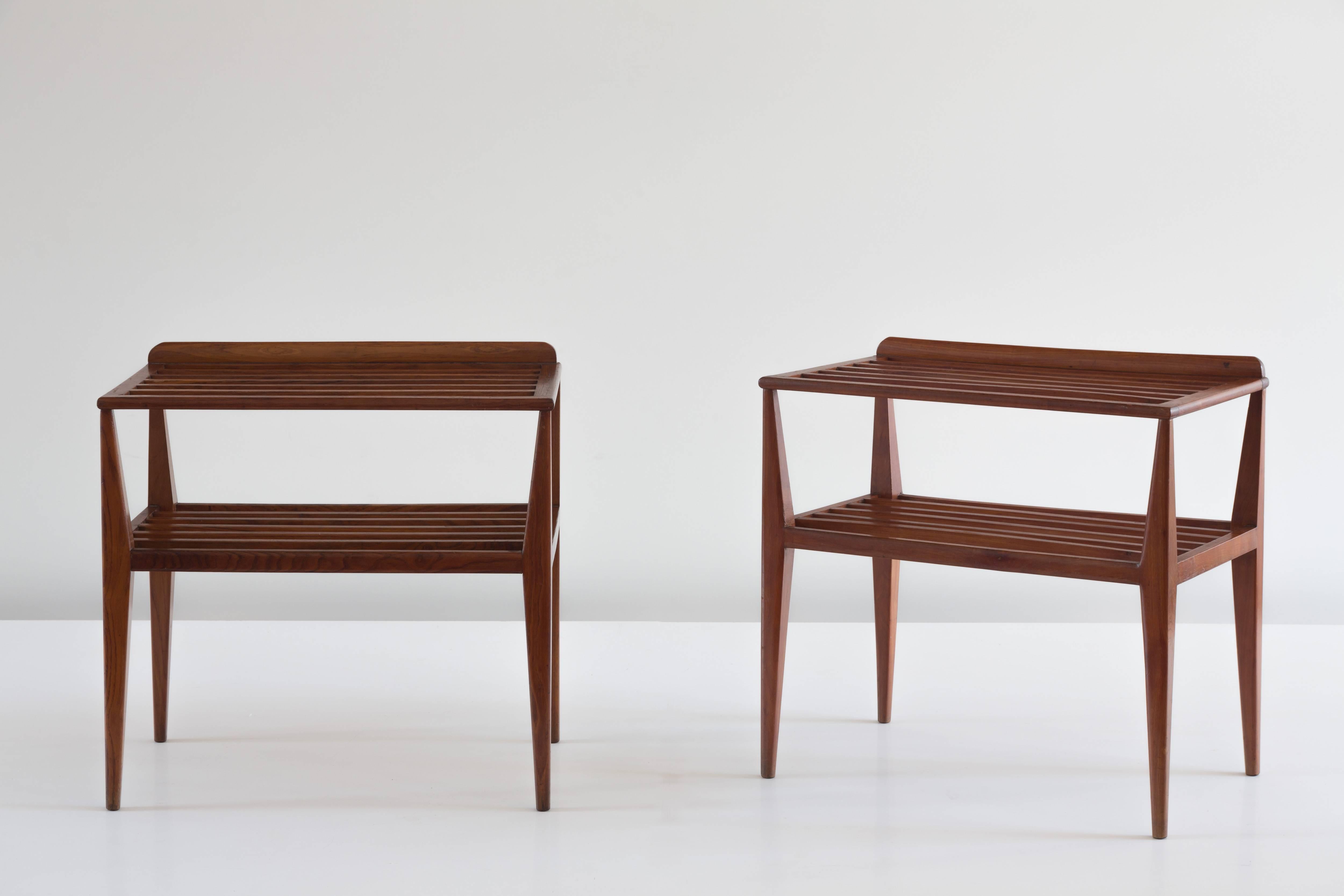 Rare pair of Gio Ponti nightstands, 1952.
Side tables designed by Arch Gio Ponti for a forniture of a Hotel Spa in center of Italy, 1952.
Sinuous legs, double shelf,
walnut 

Perfect condition. 
Measures: H 69 cm, 67 x 43 cm. 
Together with a