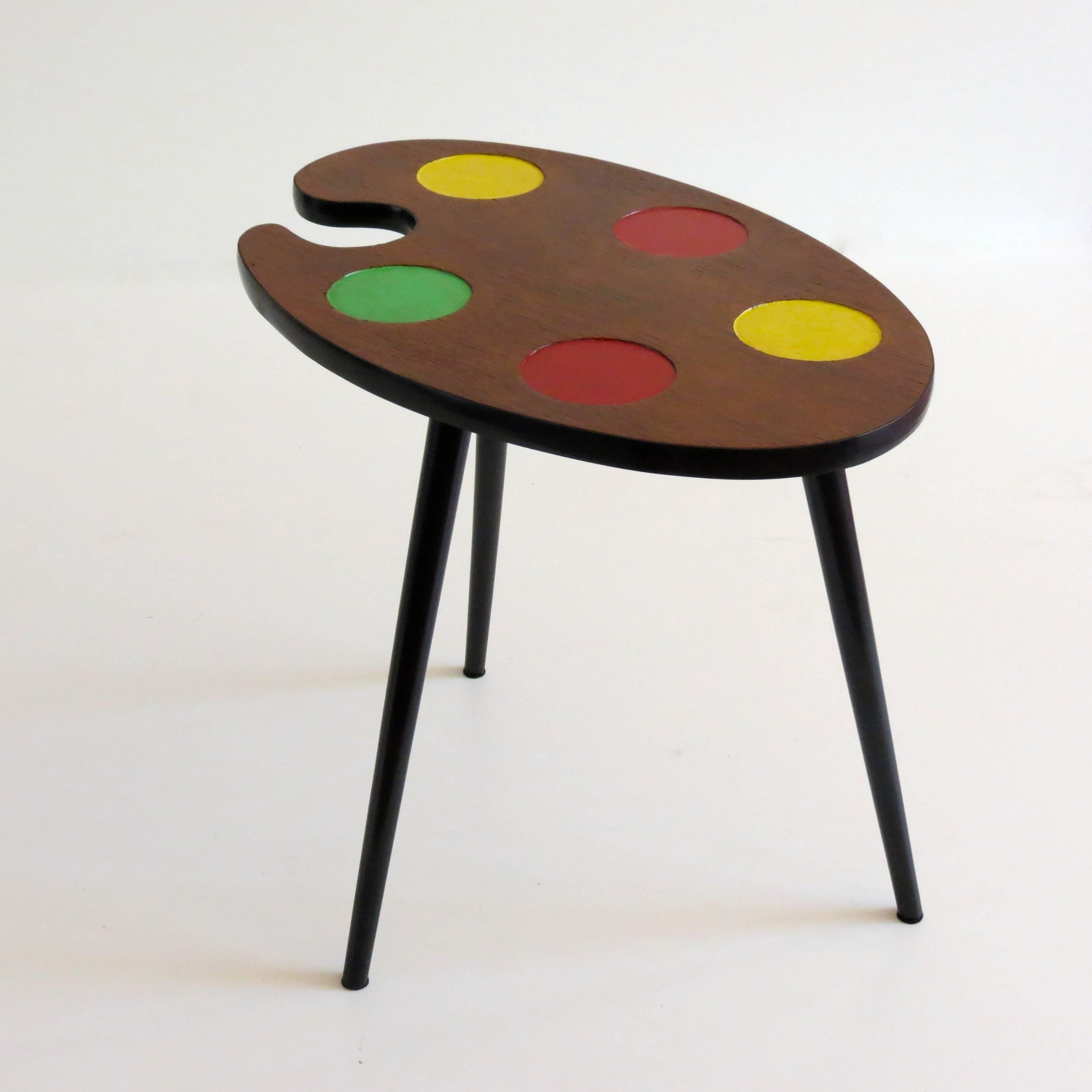 Original and fine Italian palette coffee table, circa 1950
three legs
walnut, lacquered wood and colored wood
very good original condition
Measures: height 51 cm, top height 2.5cm, diameter max 62 cm.