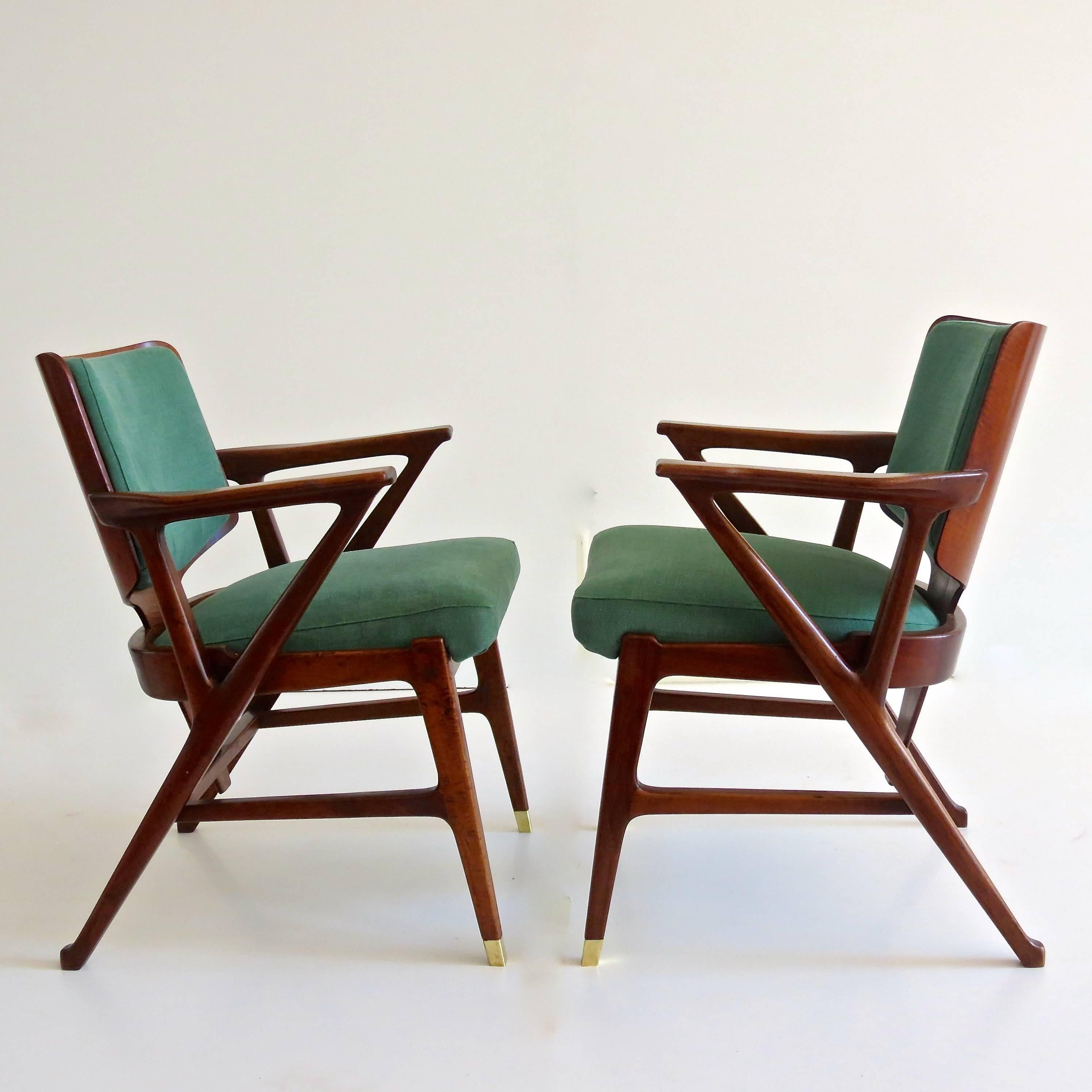 Important and very rare  set of six dining armchairs 
designed by Arch.Enrico Ciuti, 1950. 
Manufactured by F.lli Cassina. 

Walnut, brass, olive green cotton. 
Two brass sabot each armchair. 
Very good original condition. 
Re-upholstered with olive