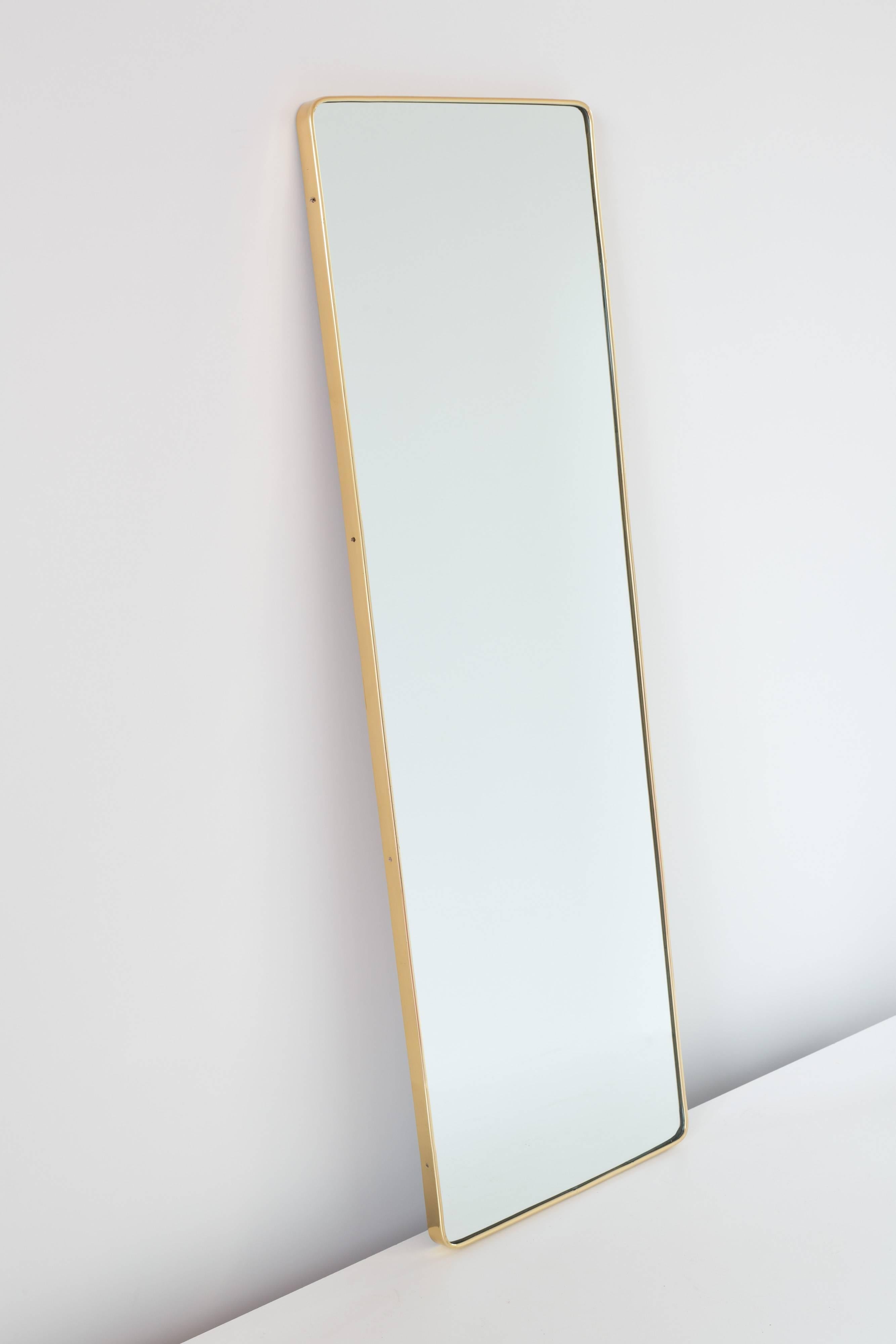 Gio Ponti mirror from the original furniture of the hotel Parco dei Principi, Rome, 1964. 
Manufactured by Fontana Arte. 
Measures: H 144 cm, 46 x 3. 
Brass, mirror and walnut.
Sold with a copy of a letter of authentication from Lisa Licitra
