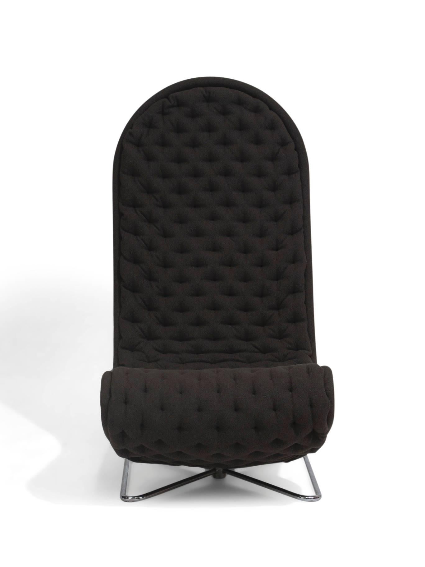 High back cantilevered lounge chair designed by Verner Panton for Fritz Hansen; quilted upholstery in the original grey wool textile on a chrome-plated steel butterfly base.