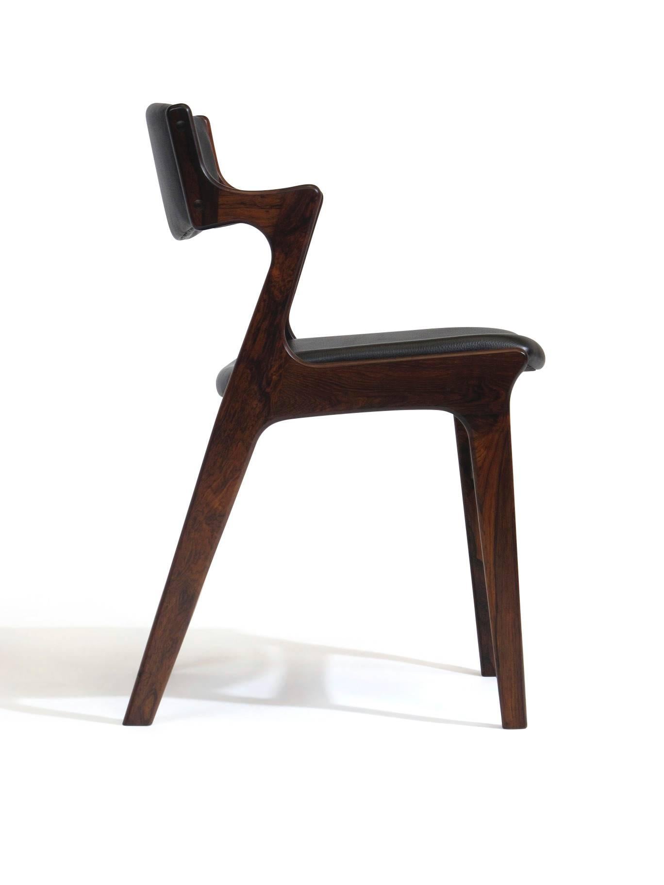 Scandinavian Modern Four Danish Rosewood and Black Leather Dining Chairs