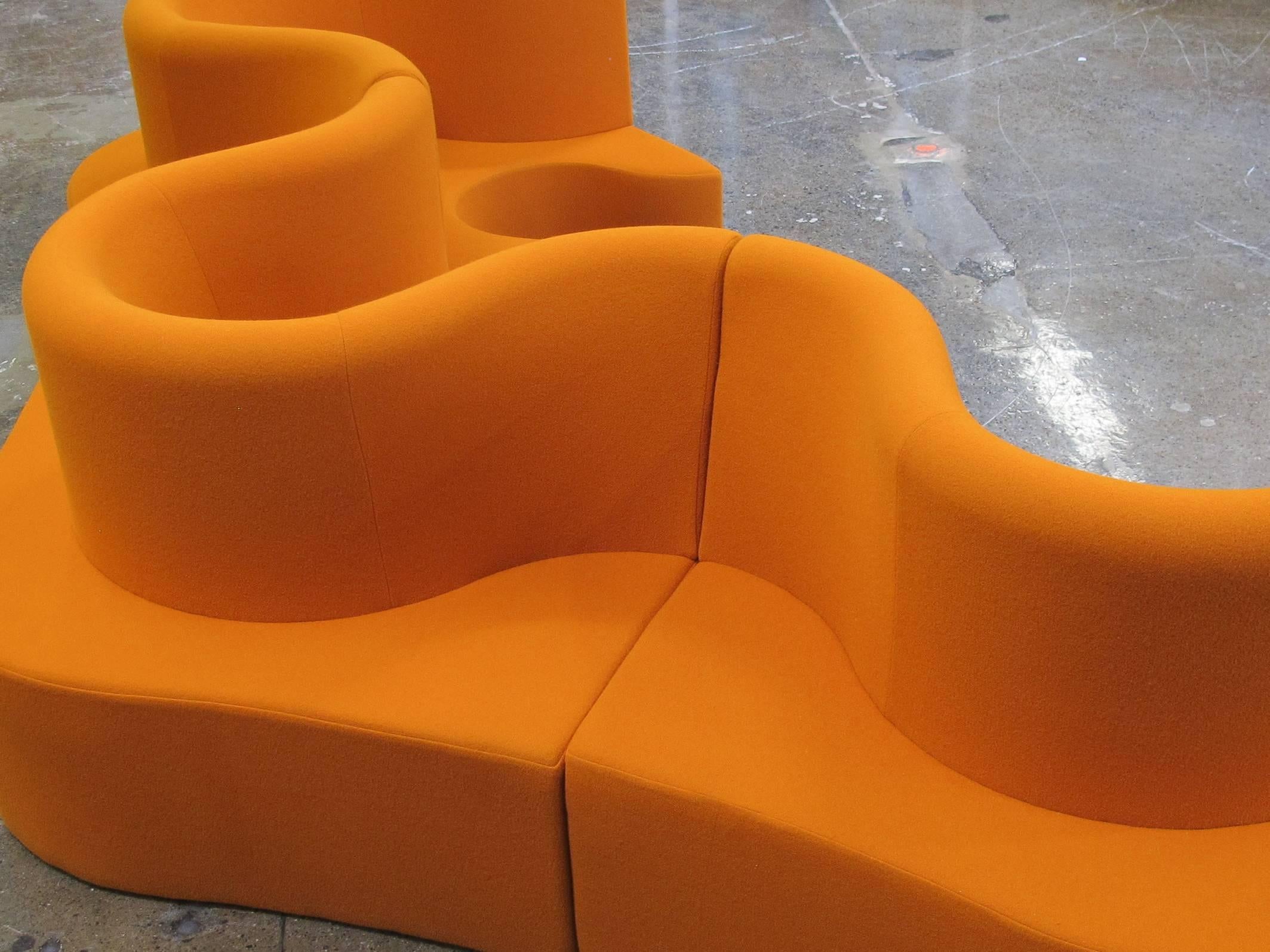 Cloverleaf modular sofa in three connected sections designed by Verner Panton, 1969. A curvy backrest provides comfortable seating on both sides of the sofa's dynamic form. Perfect for an open floor plan in a private or public space. Upholstered in