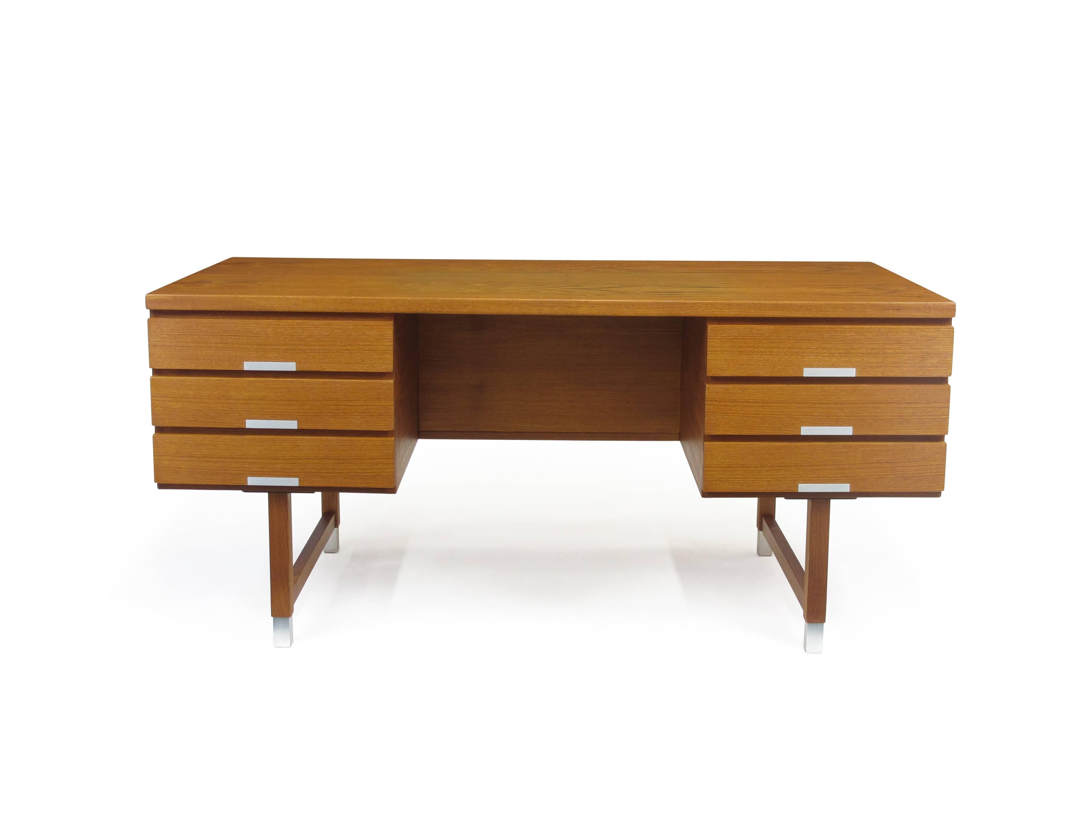 Teak desk designed by Kai Kristiansen for Feldballes Møbelfabrik Model EP401 Denmark. Teak with six drawers and recessed aluminium accents.