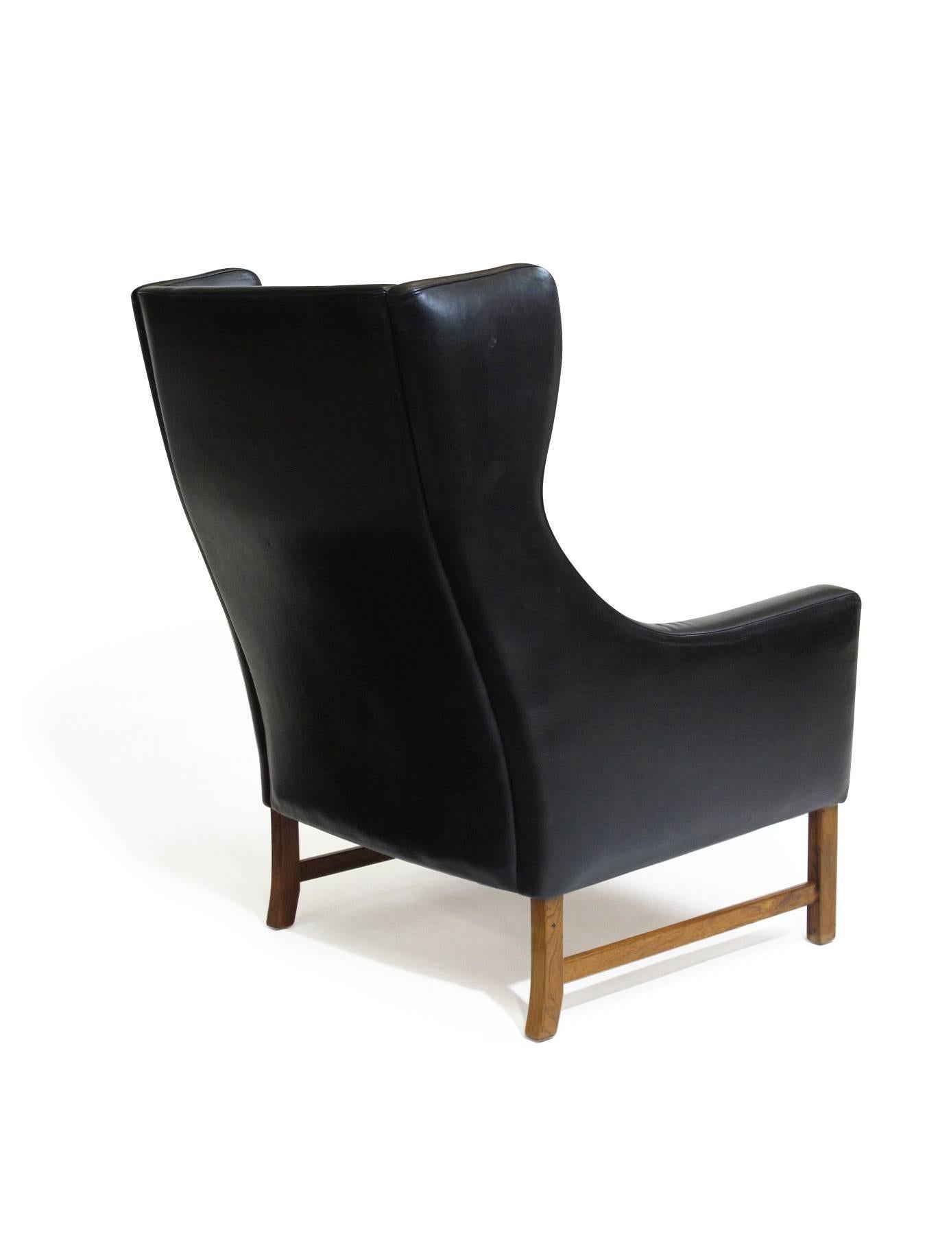 Fredrik Kayser Rosewood and Black Leather High-Back Danish Lounge Chair In Good Condition In Oakland, CA
