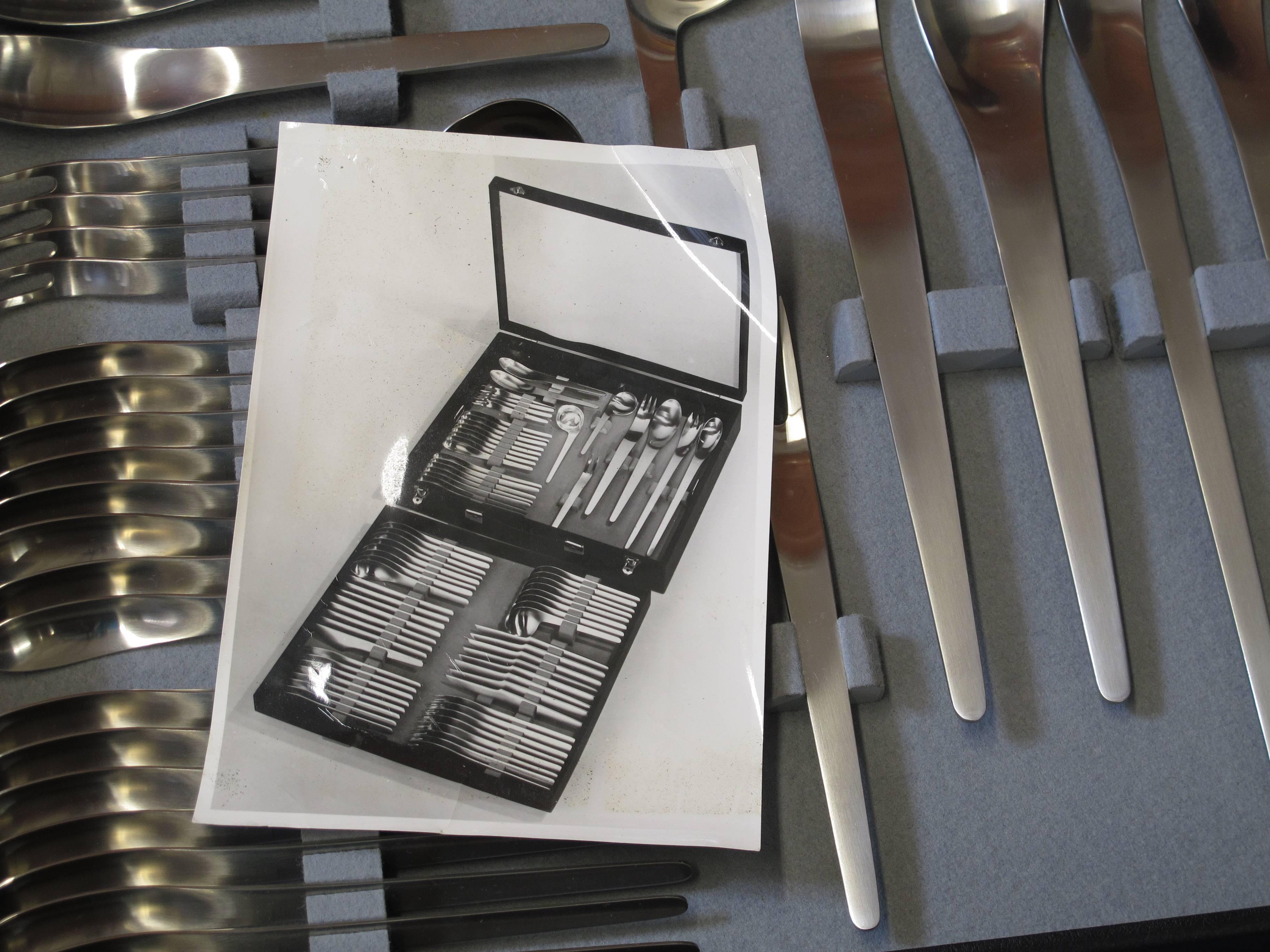 Polished Arne Jacobsen for A. Michelsen Stainless Flatware Service for Eight 
