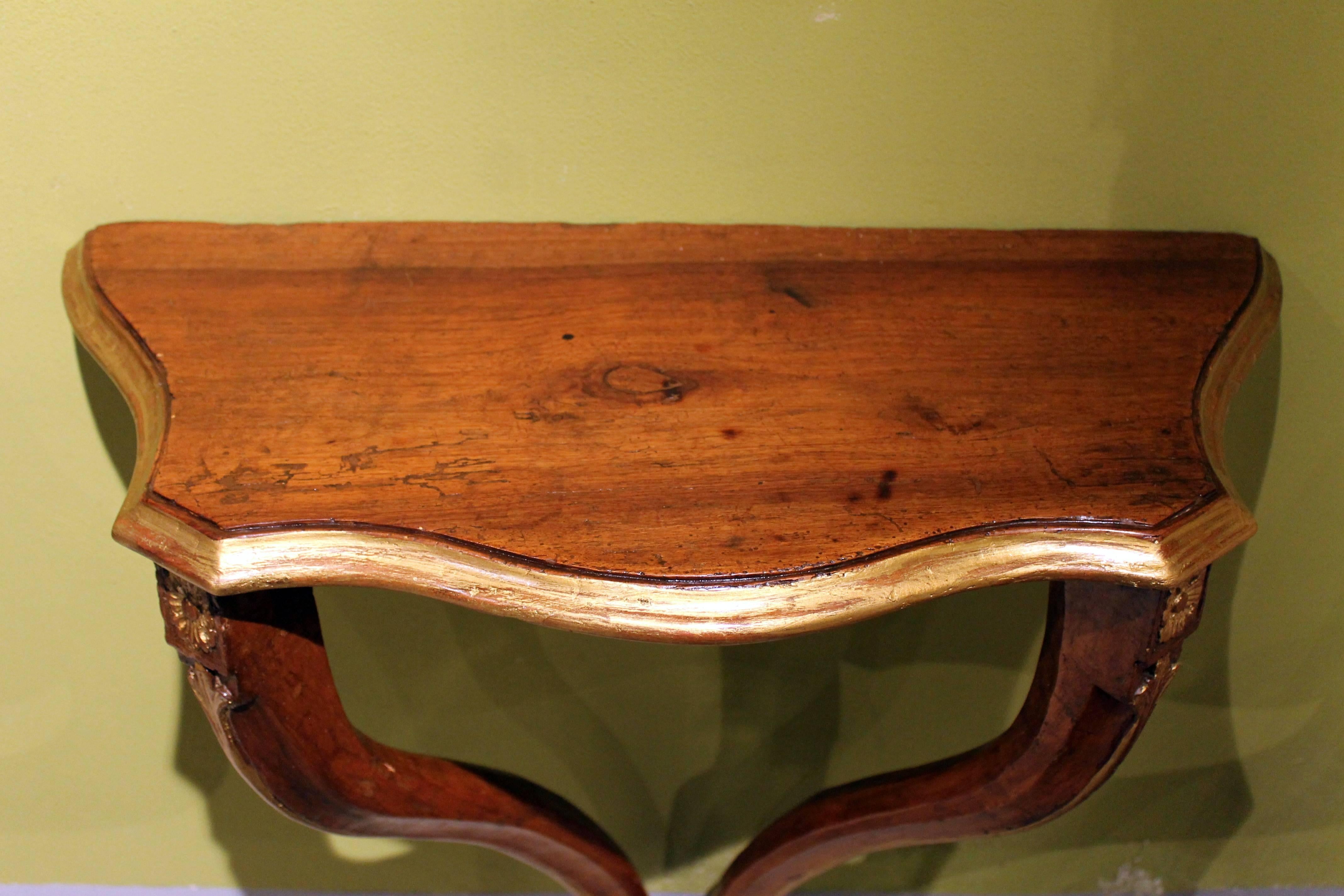 Hand-Carved Italian 18th Century Carved Walnut and Parcel Gilt Wall Mount Curvy Console