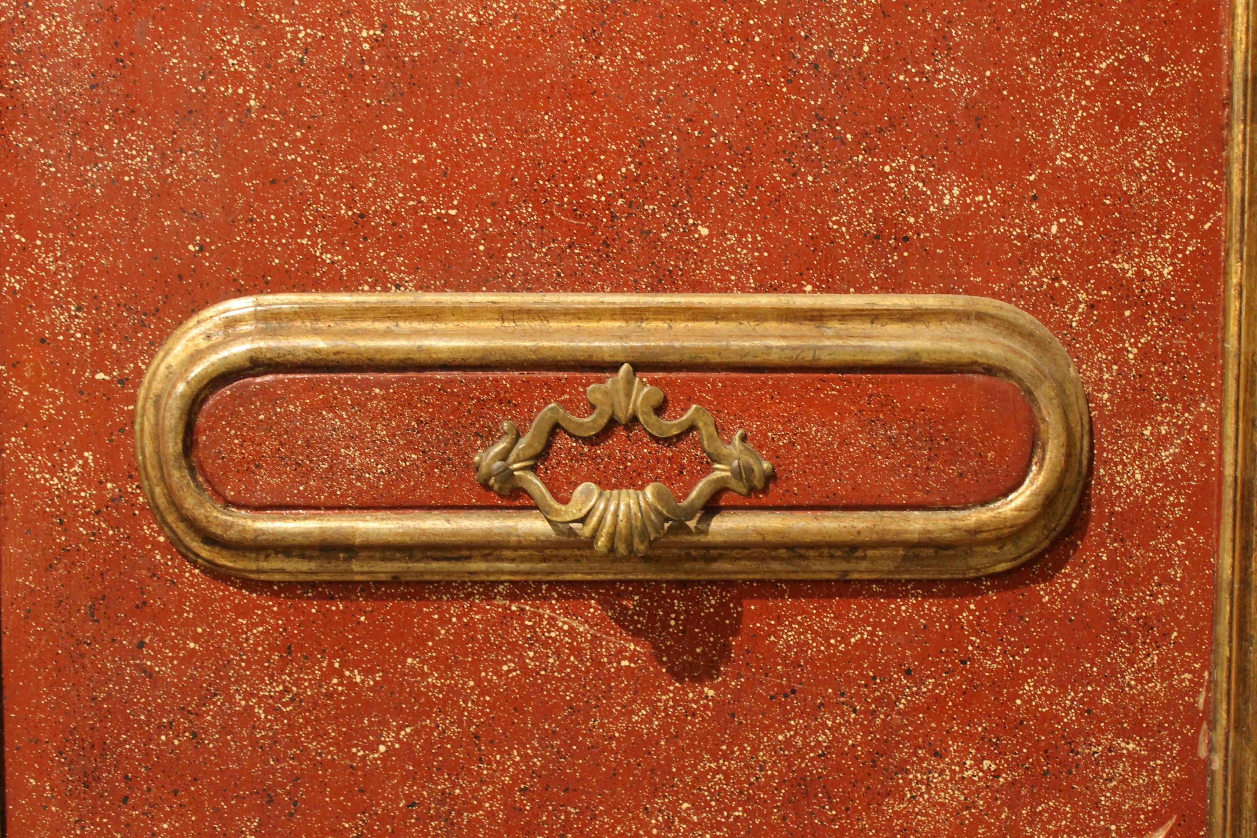 This Florentine late 19th-early 20th century double wood doors are lacquered as faux red porphyry with gold leaf details troughout. Original gilt brass handles. The doors open inward.
Provenance: Florentine private Villa.
Measures: Each door width