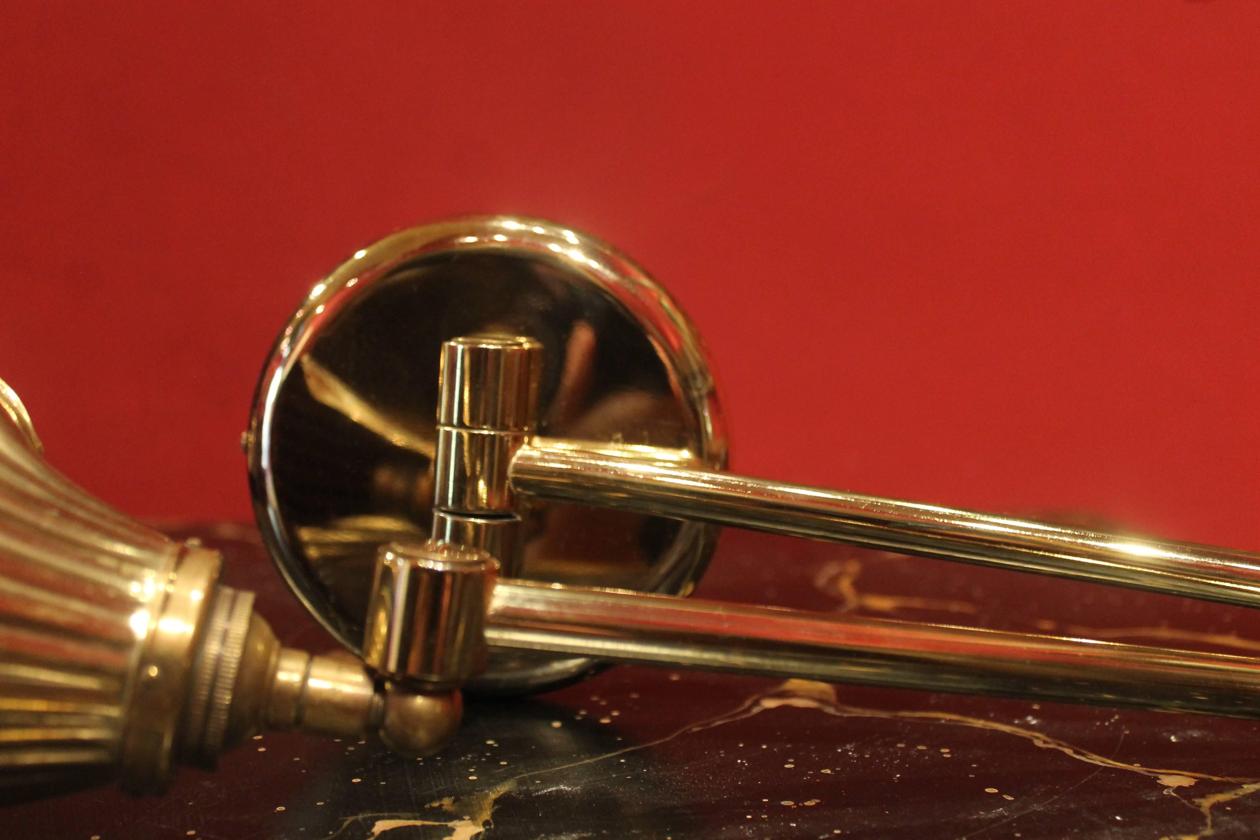 20th Century Pair of Italian Gilt Brass Swing Arm Shell Sconces, circa 1950