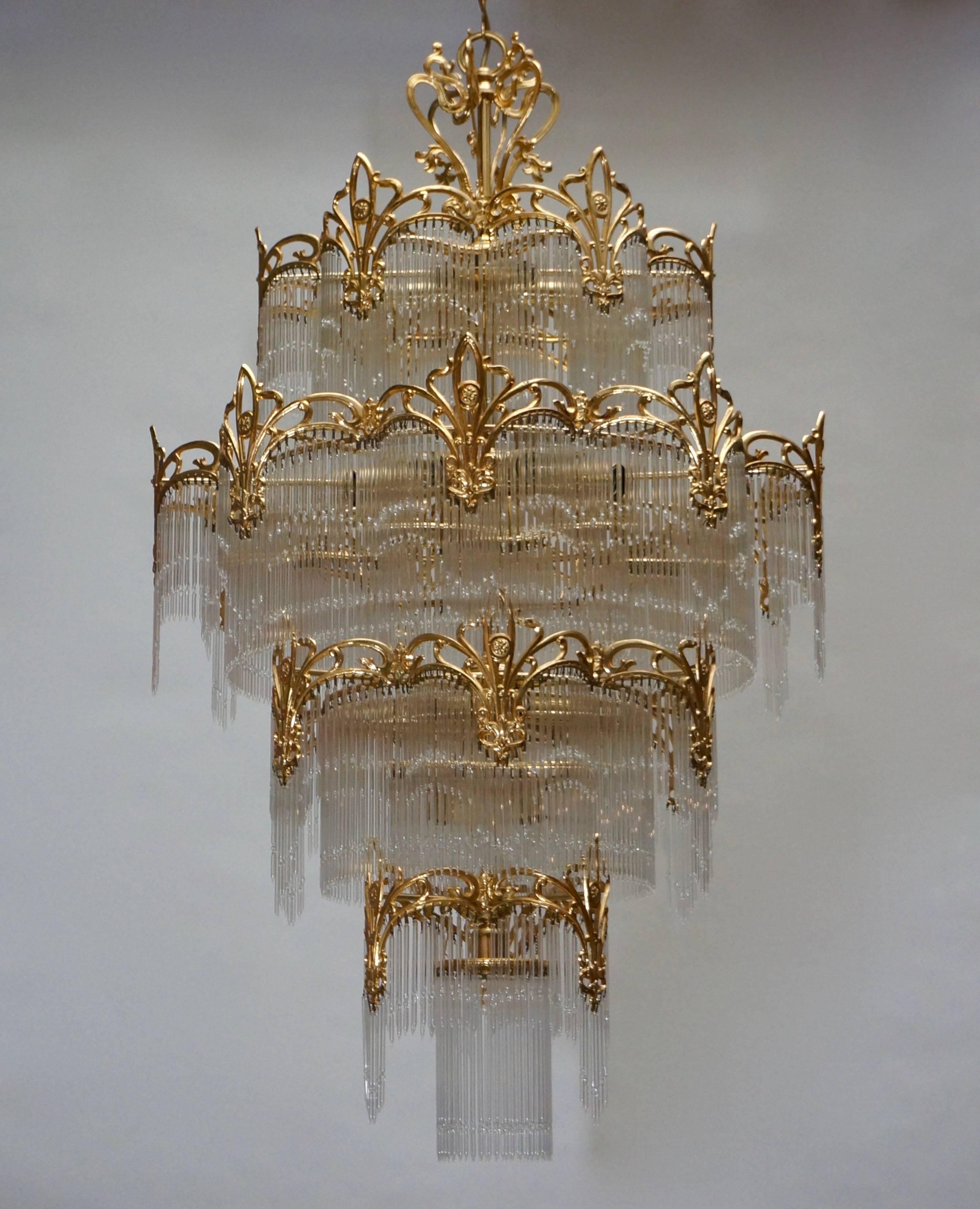 Very huge high quality brass and Murano glass chandelier. There are 1500 Murano glasses on a gold-plated fixture.
