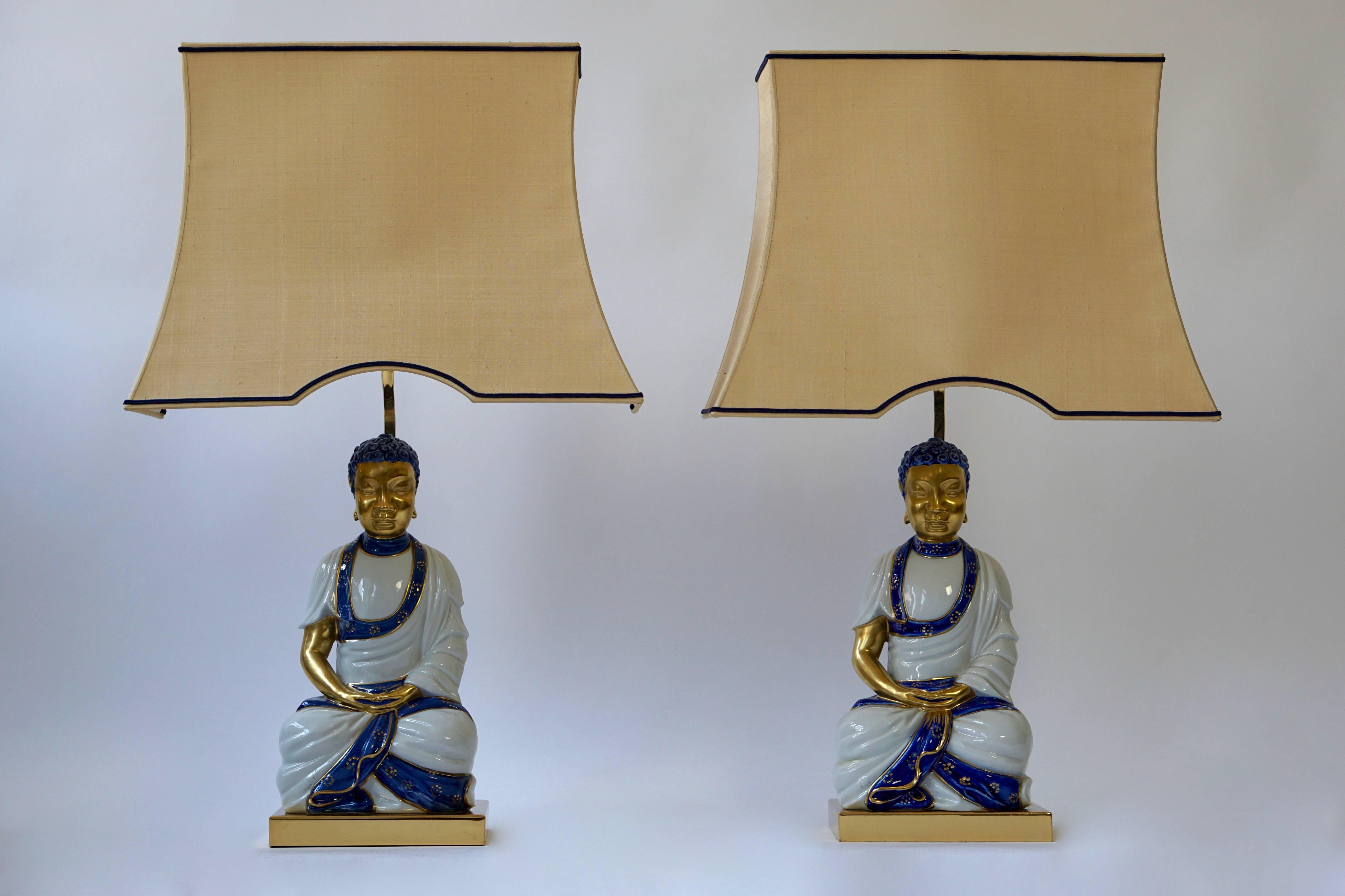 Pair of Hollywood Regency standing Buddha table lamps.