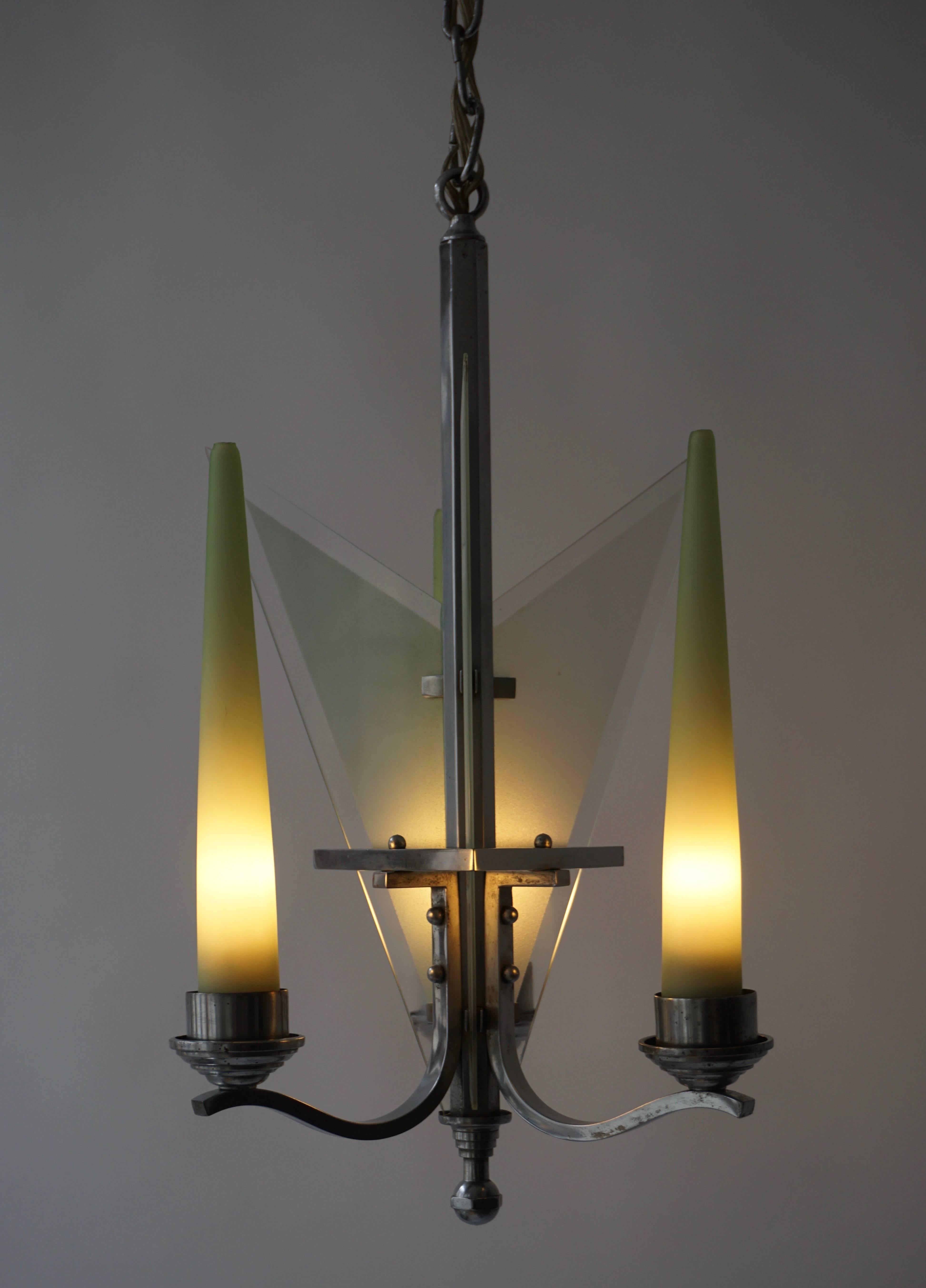 Italian Art Deco light fixture.
Total height with chain is 60 cm.
Three E14 bulbs.
 