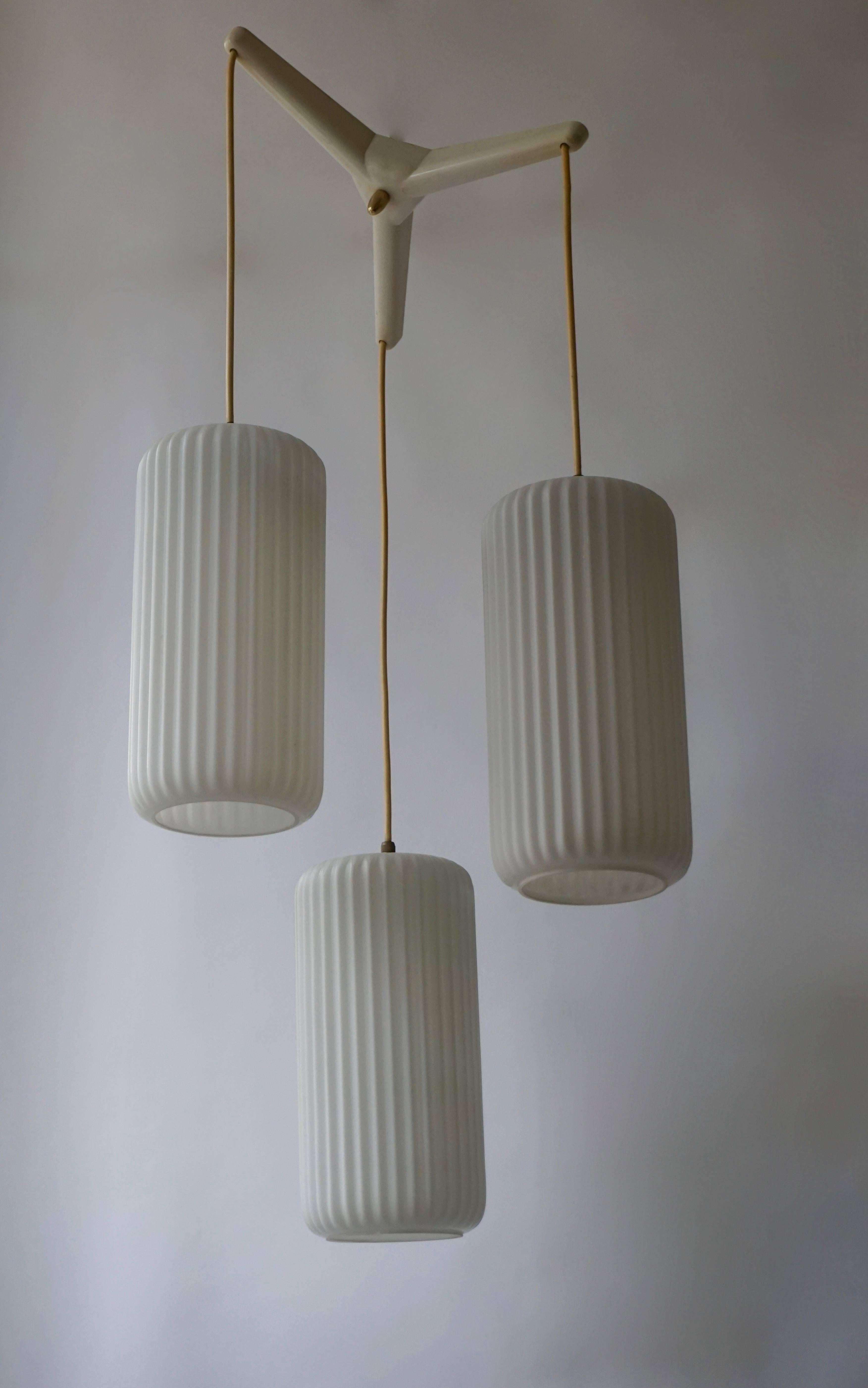 Rare ceiling light from Philips with three ribbed glass shades.

Period: 1960s
Produced by Philips in the Netherlands.
Materials: white ribbed glass and metal.
