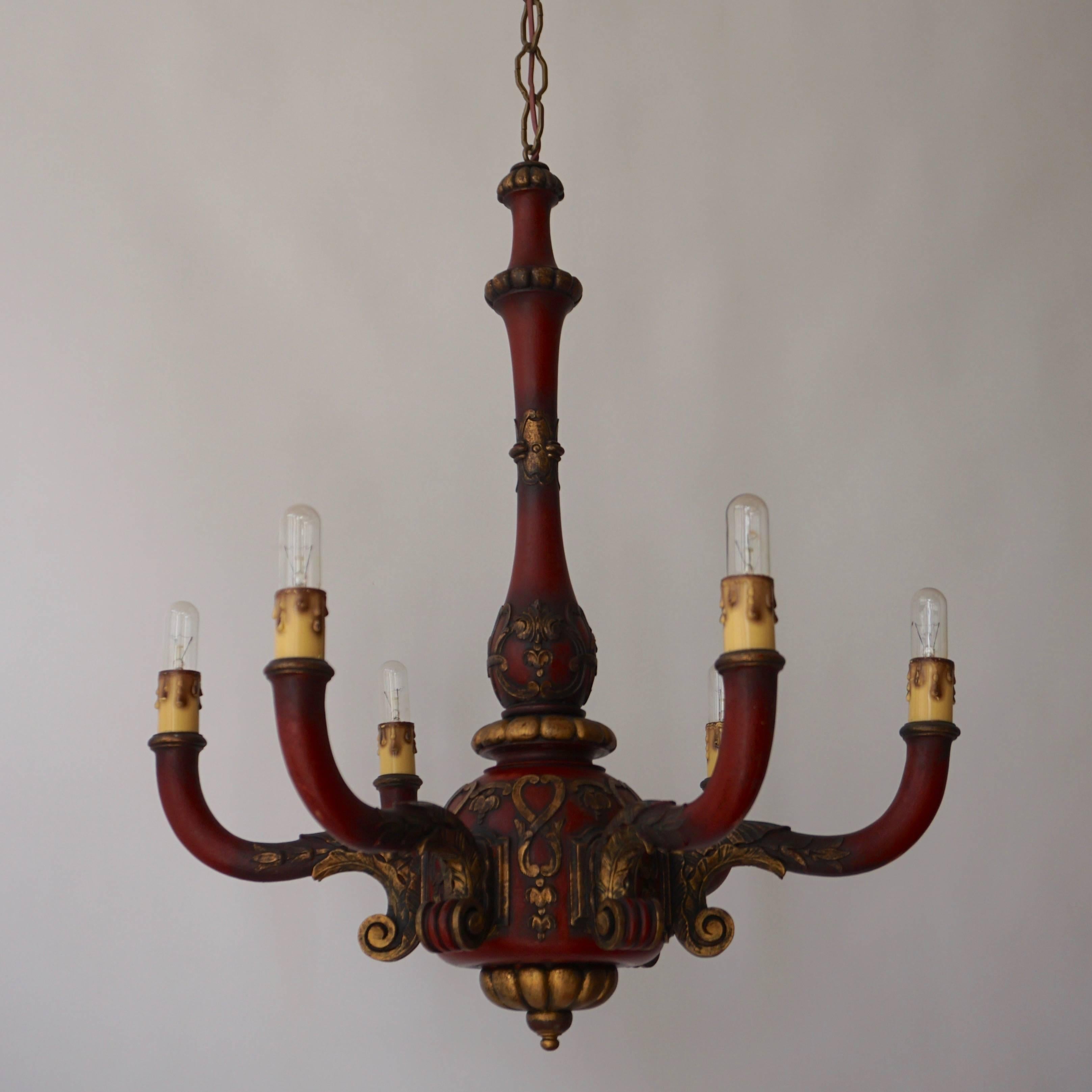 Painted wooden chandelier.
Six E14 bulbs.
Diameter 60 cm.
Height 63 cm.
Height with the chain 120 cm.