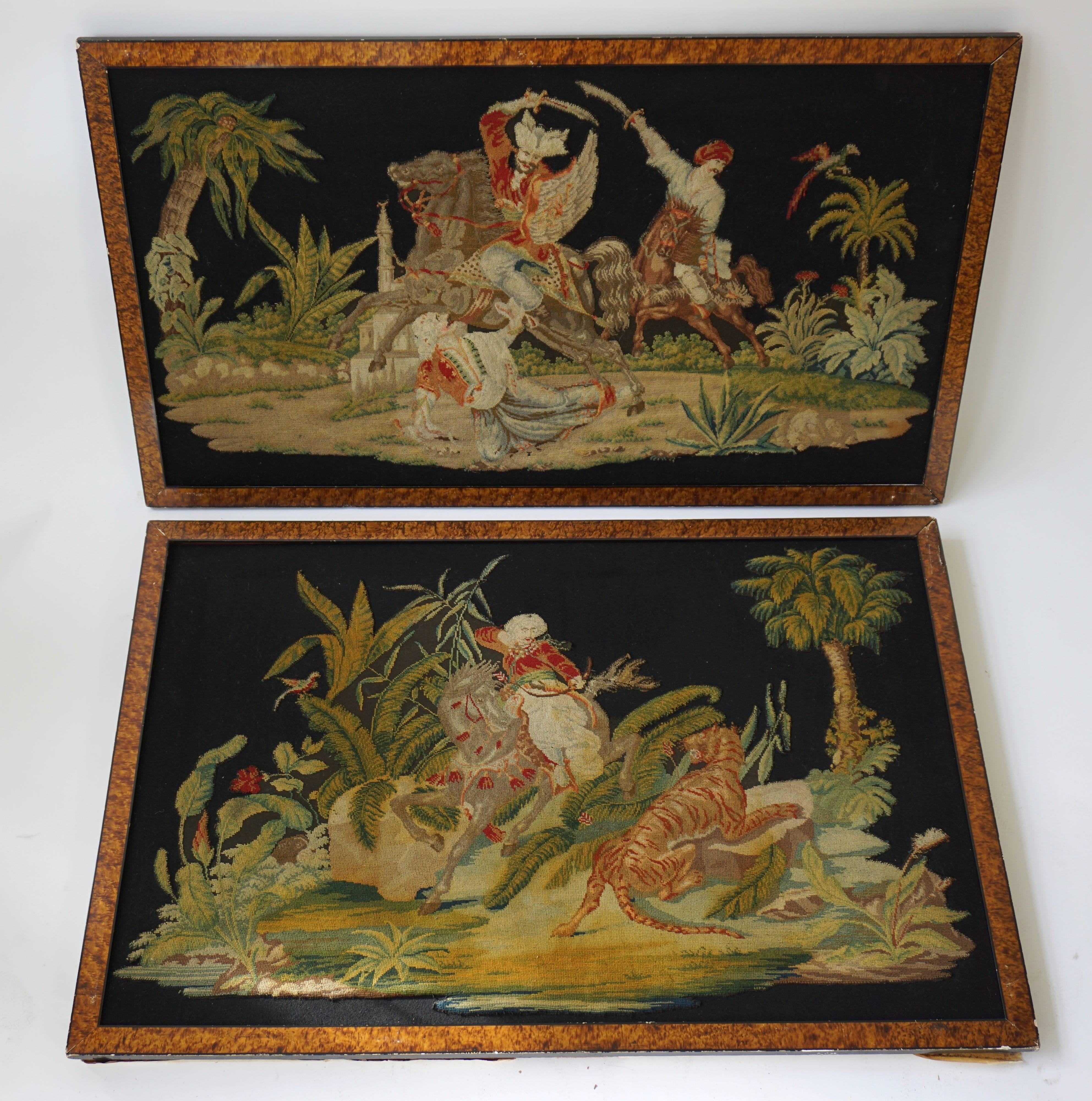 Coppia di pannelli cuciti a gros - point raffiguranti scene orientaliste: Uno con una caccia alla tigre e l'altro con una scena di battaglia, entrambi in un contesto di vegetazione tropicale su fondo nero, in cornici di radica di noce, metà del XIX