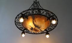 Wrought Iron and Alabaster Art Deco Chandelier