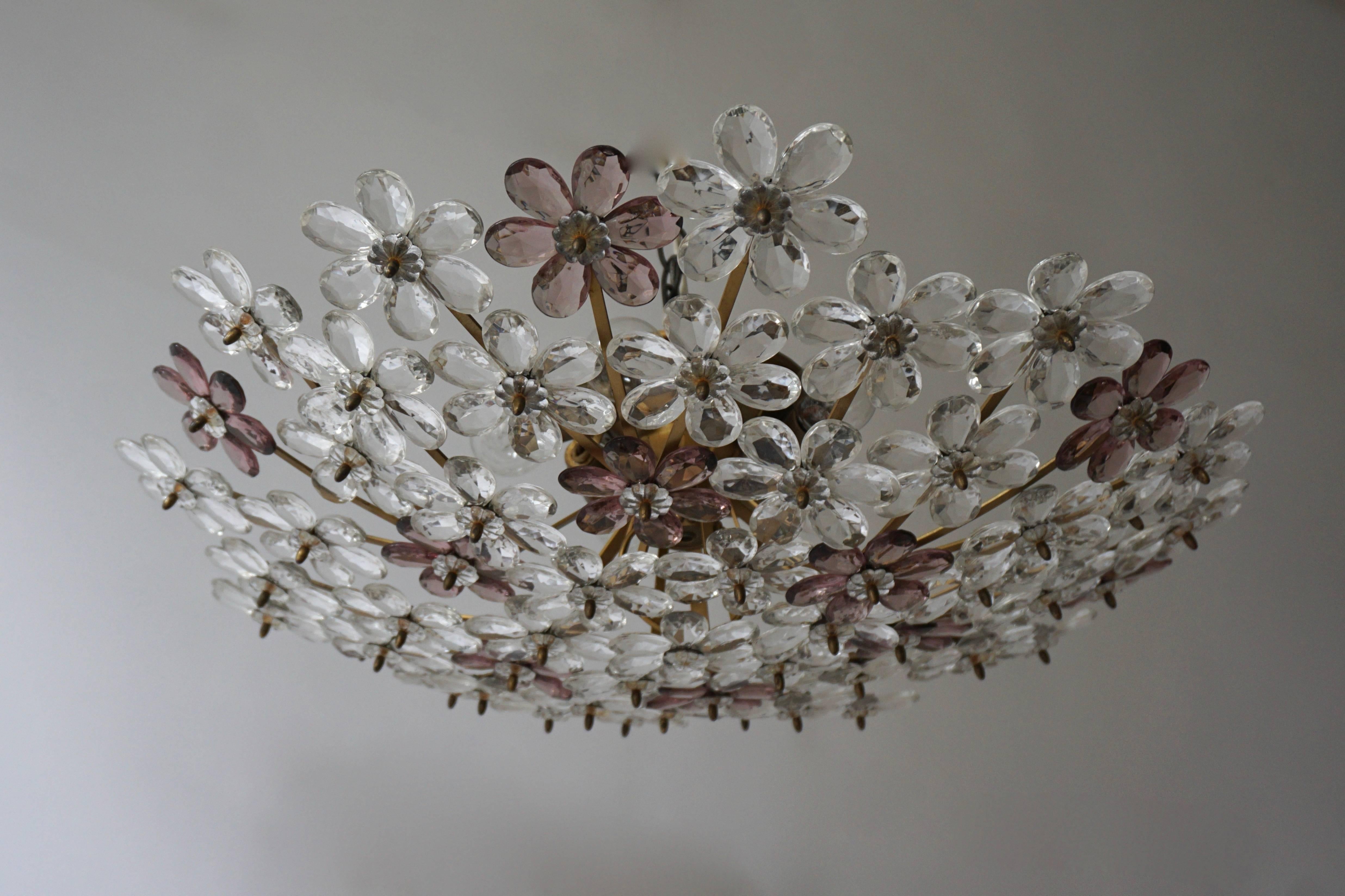 One of two Italian glass and brass flush mounts or wall lights with 60 glass flowers.
Measures: Diameter: 65 cm. 
Height:18 cm.
The light requires five single E14 screw fit lightbulbs (60Watt max.) LED compatible.