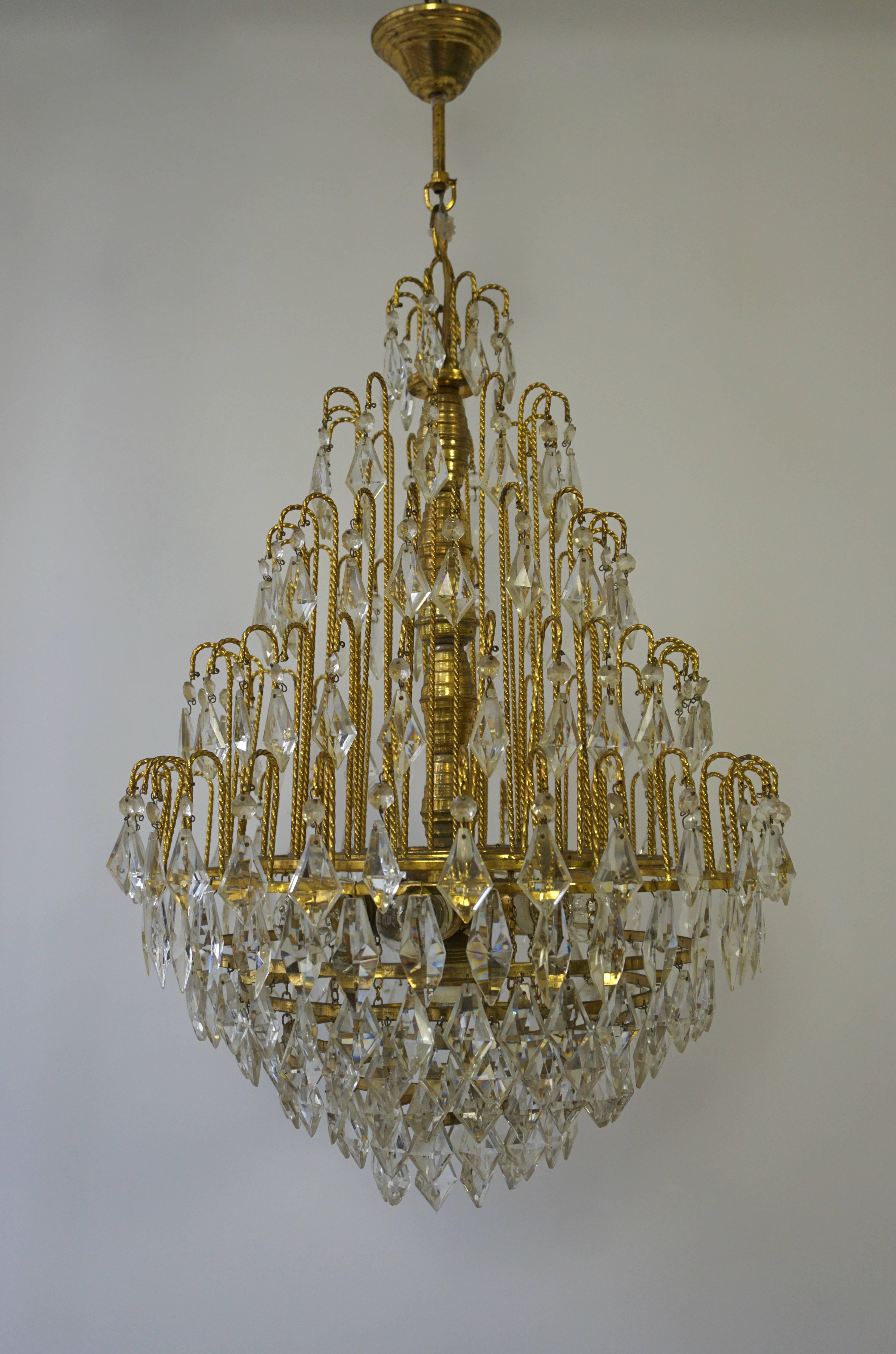 20th Century Elegant Brass and Crystal Chandelier For Sale