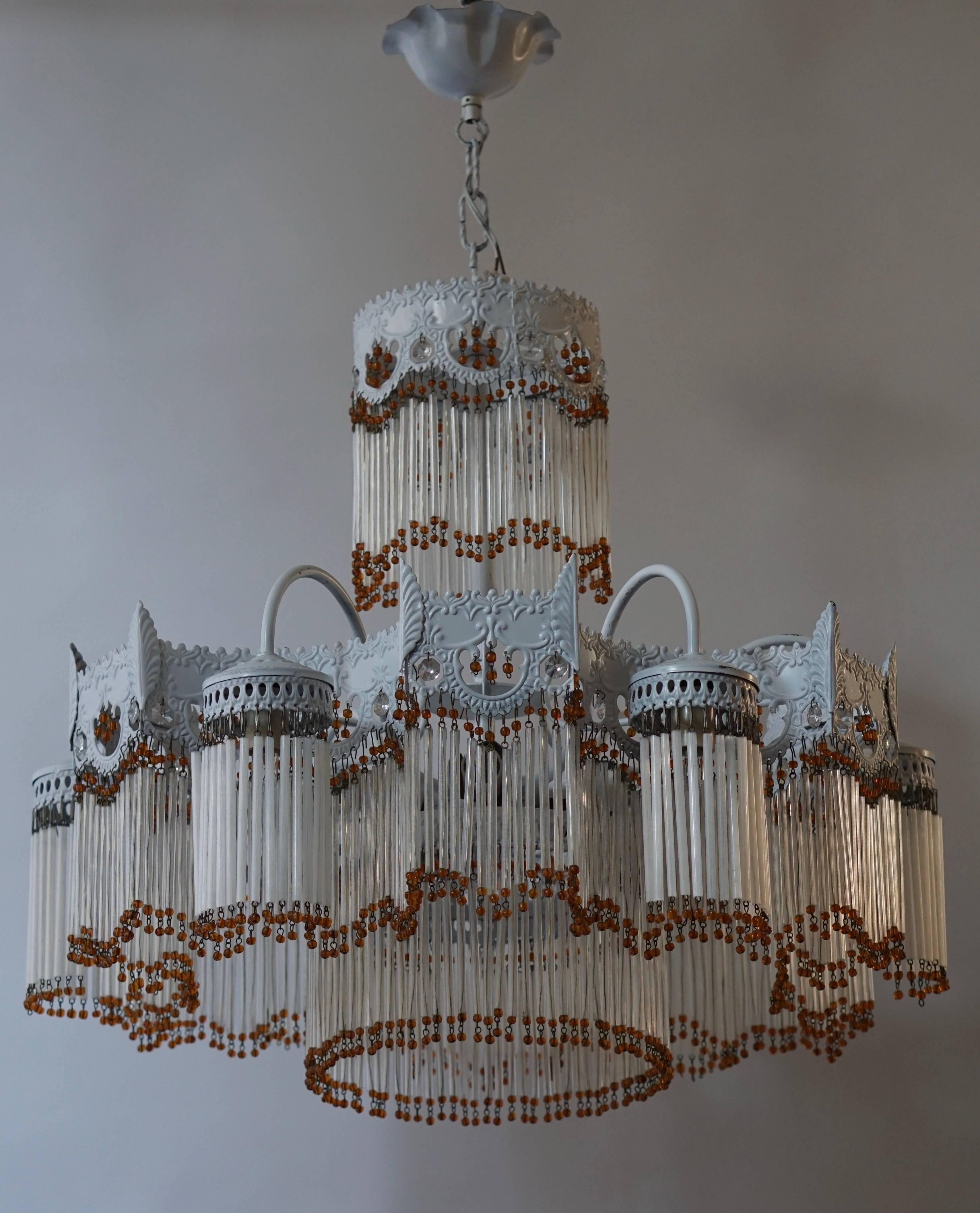 Italian Murano glass chandelier.
The frame was originally black but was later painted in white.
Diameter: 60 cm.
Total height with the chain is 80 cm.
Height without chain is 55 cm.
Six E14 bulbs.