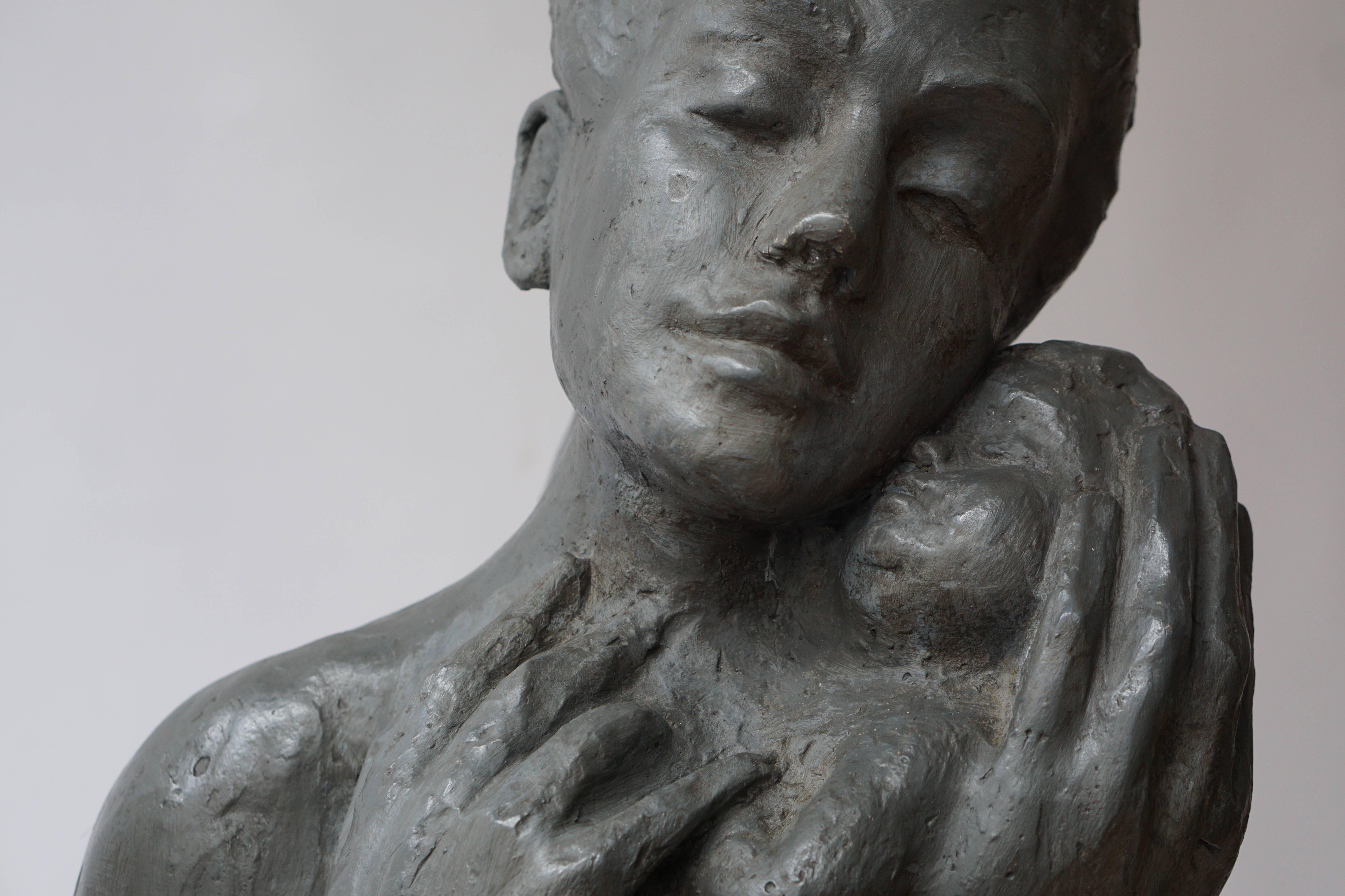Plaster Sculpture of a Mother with Baby