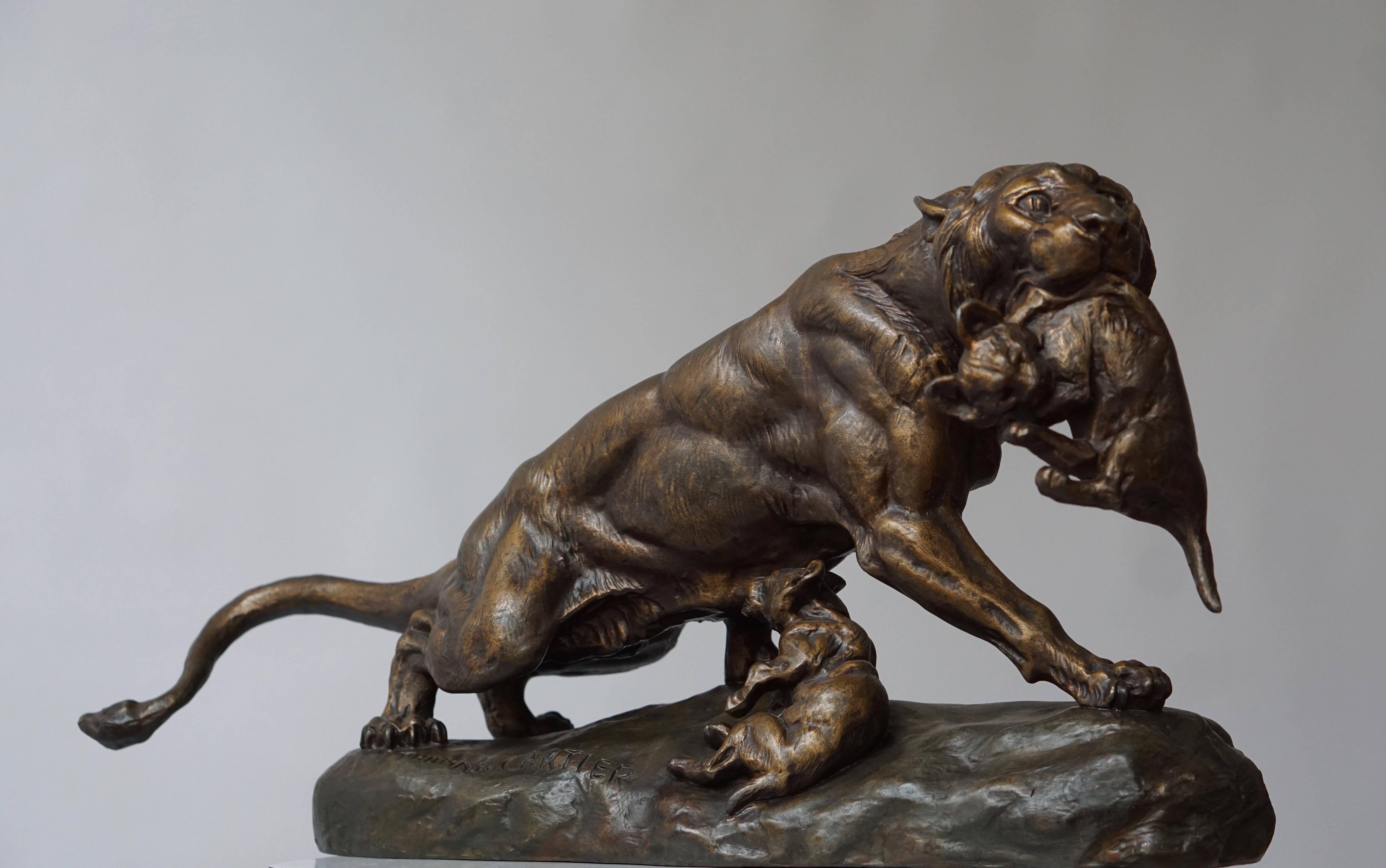 Mid-Century Modern A Gilt Spelter Lioness with her Cubs, Signed Thomas Cartier