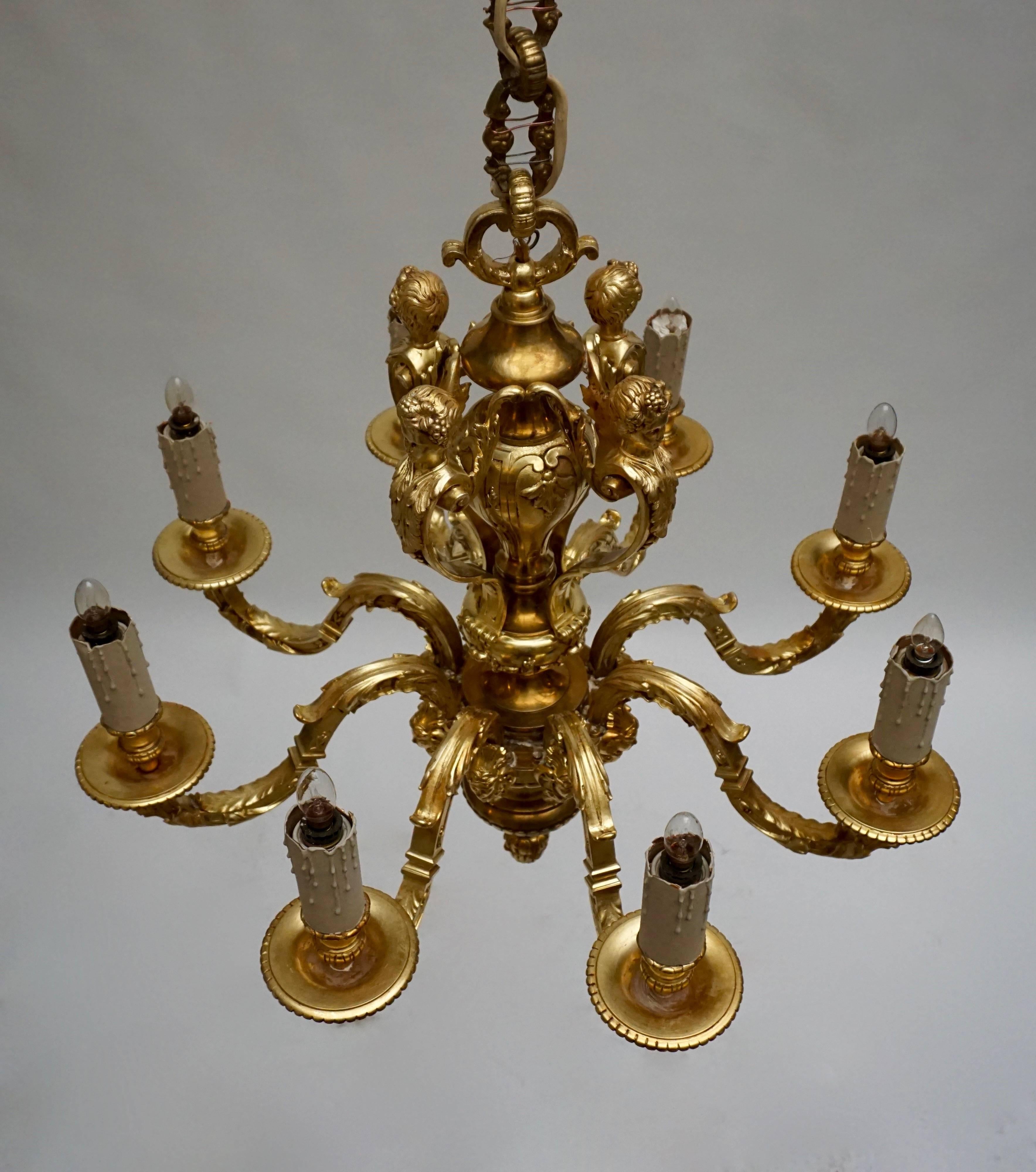 Hollywood Regency French Eight-Light Massive Bronze Chandelier with Cherubs For Sale
