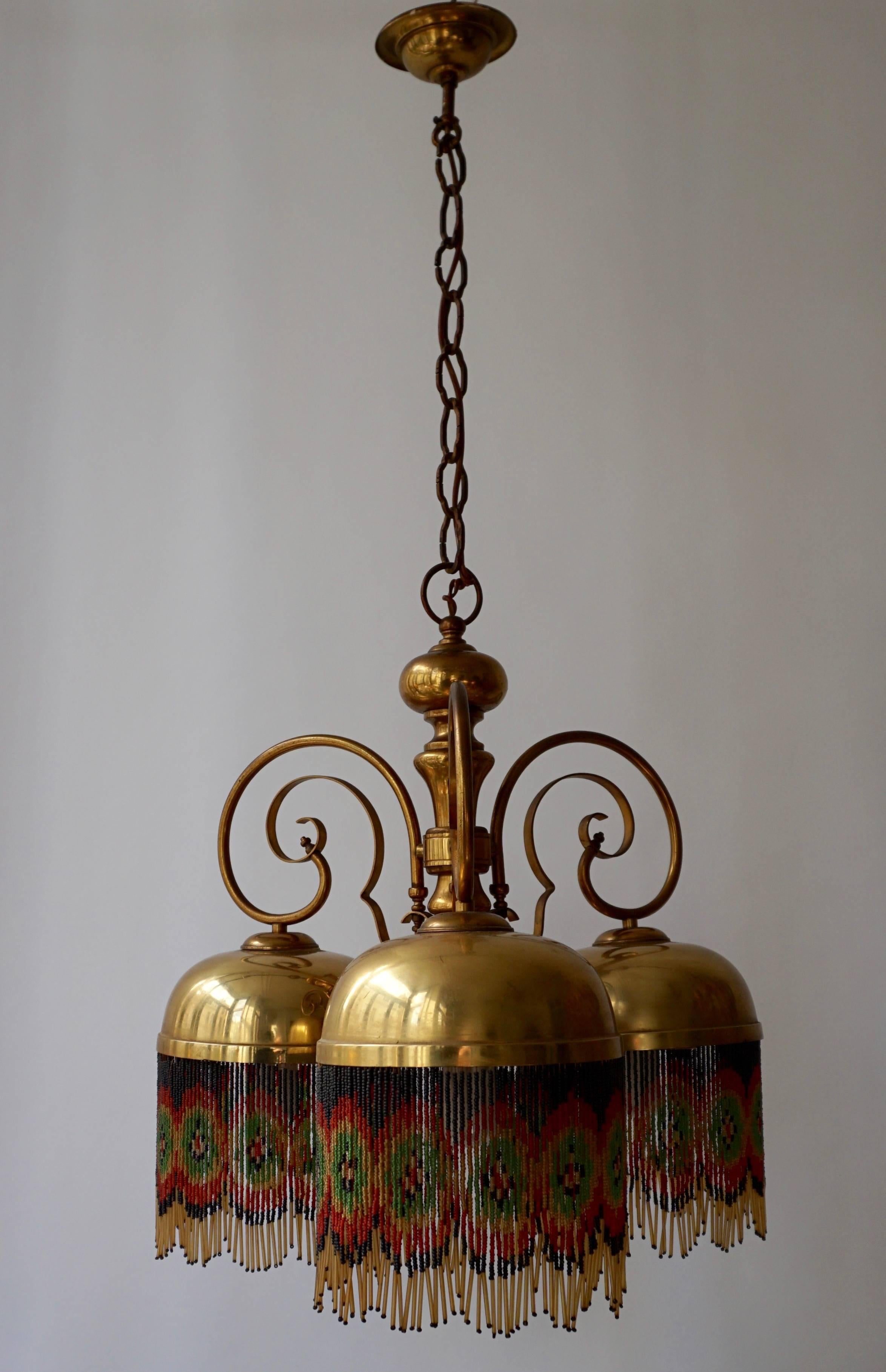 Italian copper and glass chandelier.
Diameter: 46 cm.
Height fixture 50 cm.
Total height with the chain 95 cm.