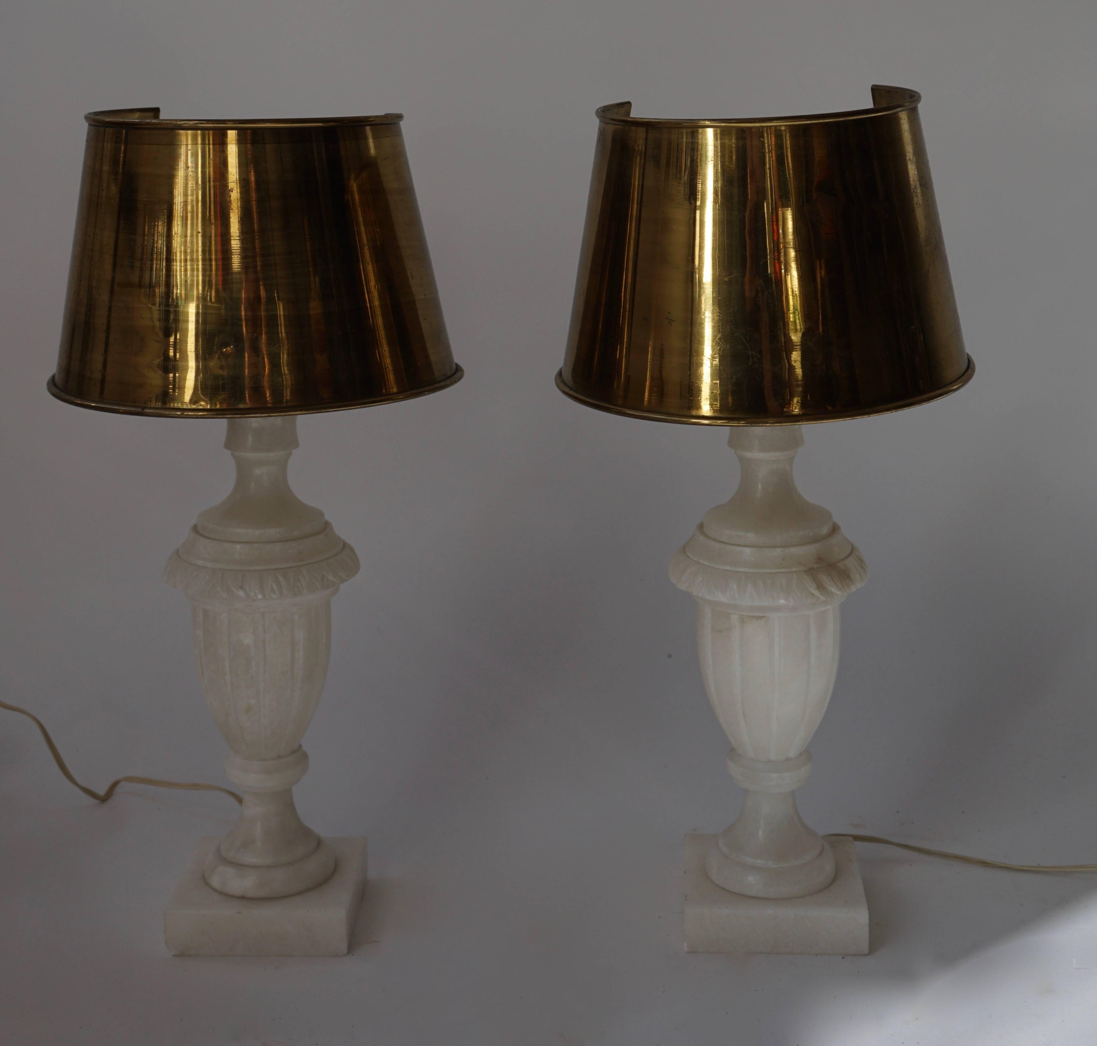 Two alabaster with copper shades table lamps.
Measures: Diameter 20 cm.
Height 52 cm.