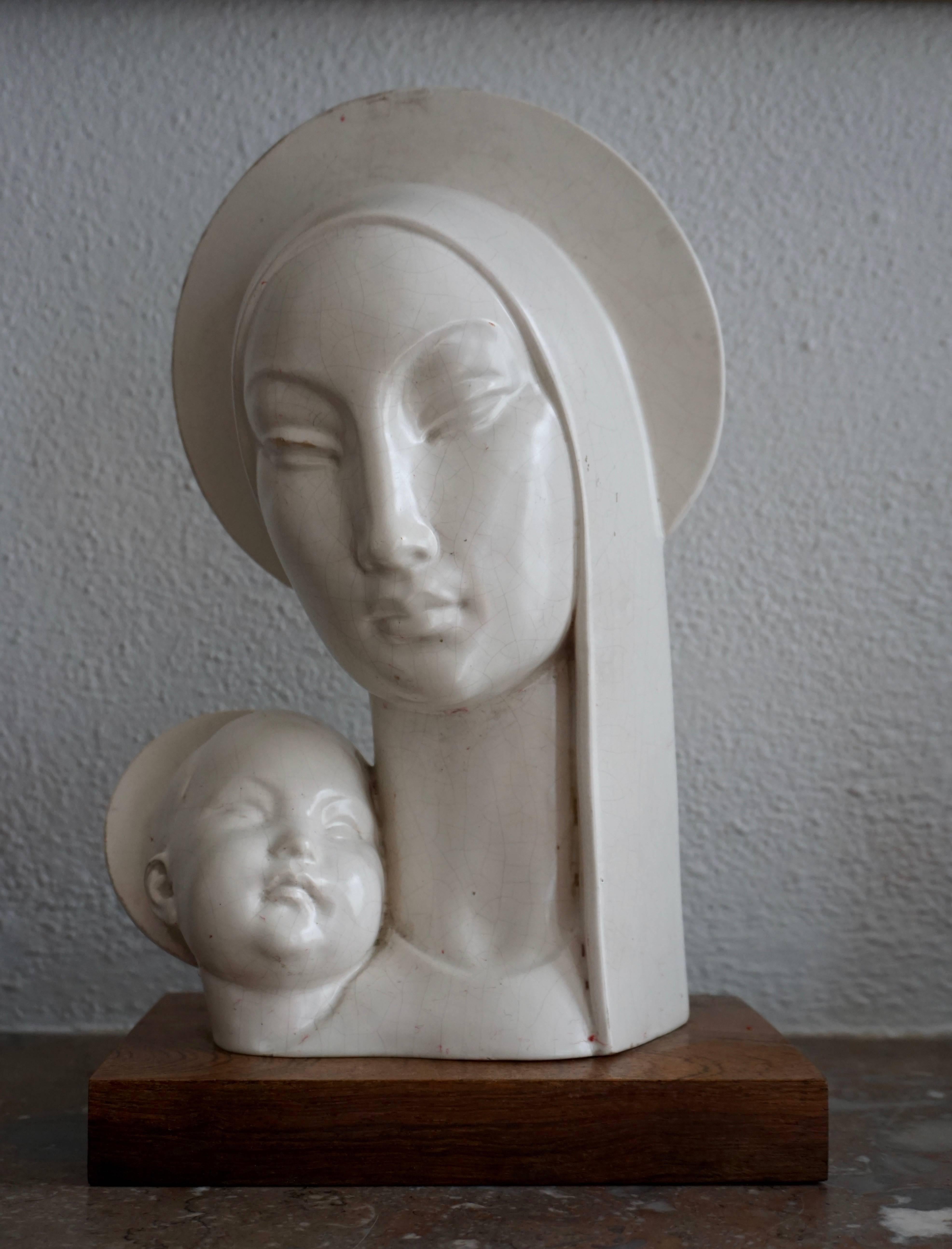 Mid-20th century stylized plaster buste of Madonna and Child.
Measures: Height 34 cm.