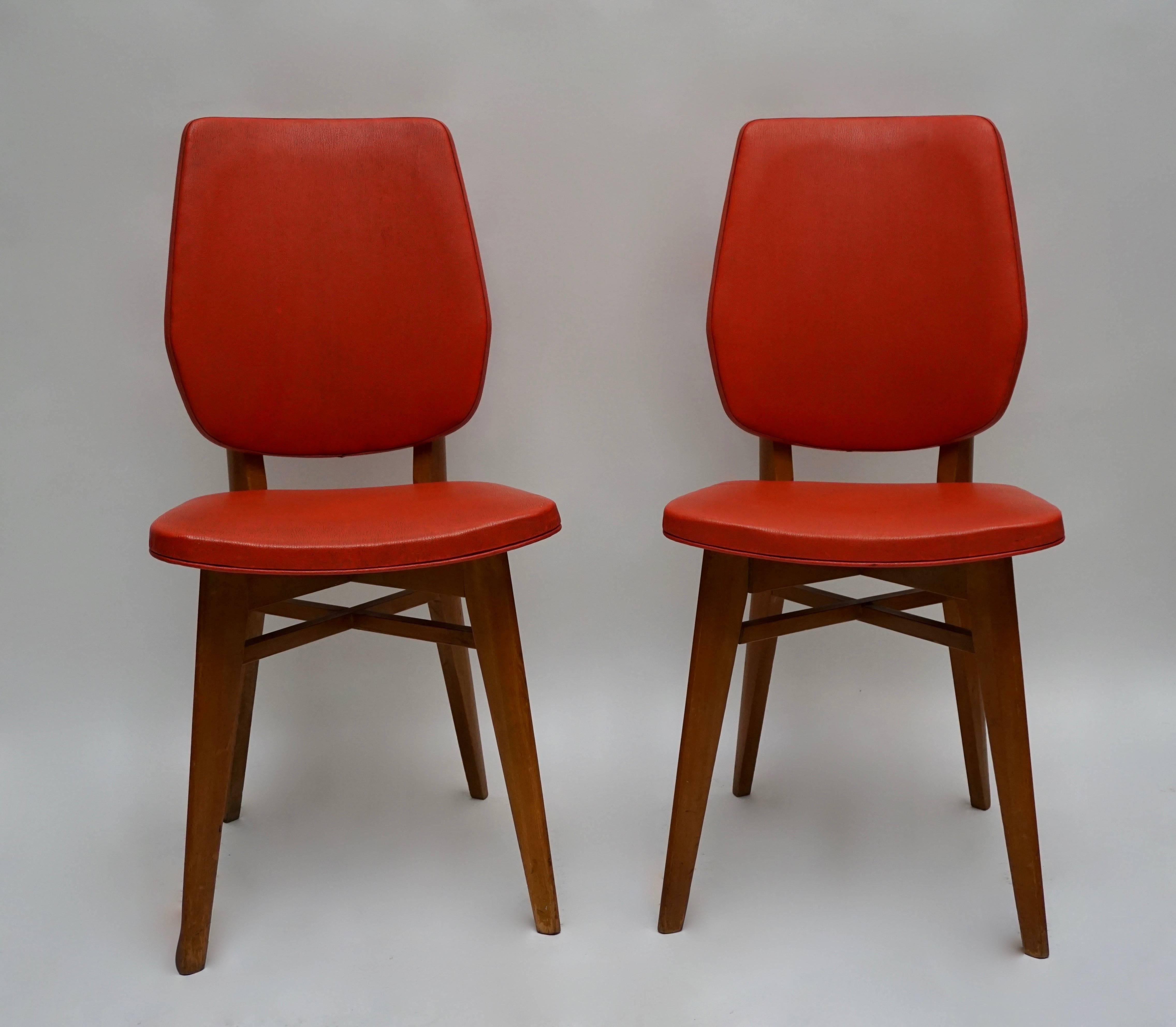 These are a very nice set of six French dining chairs, circa 1955.
 