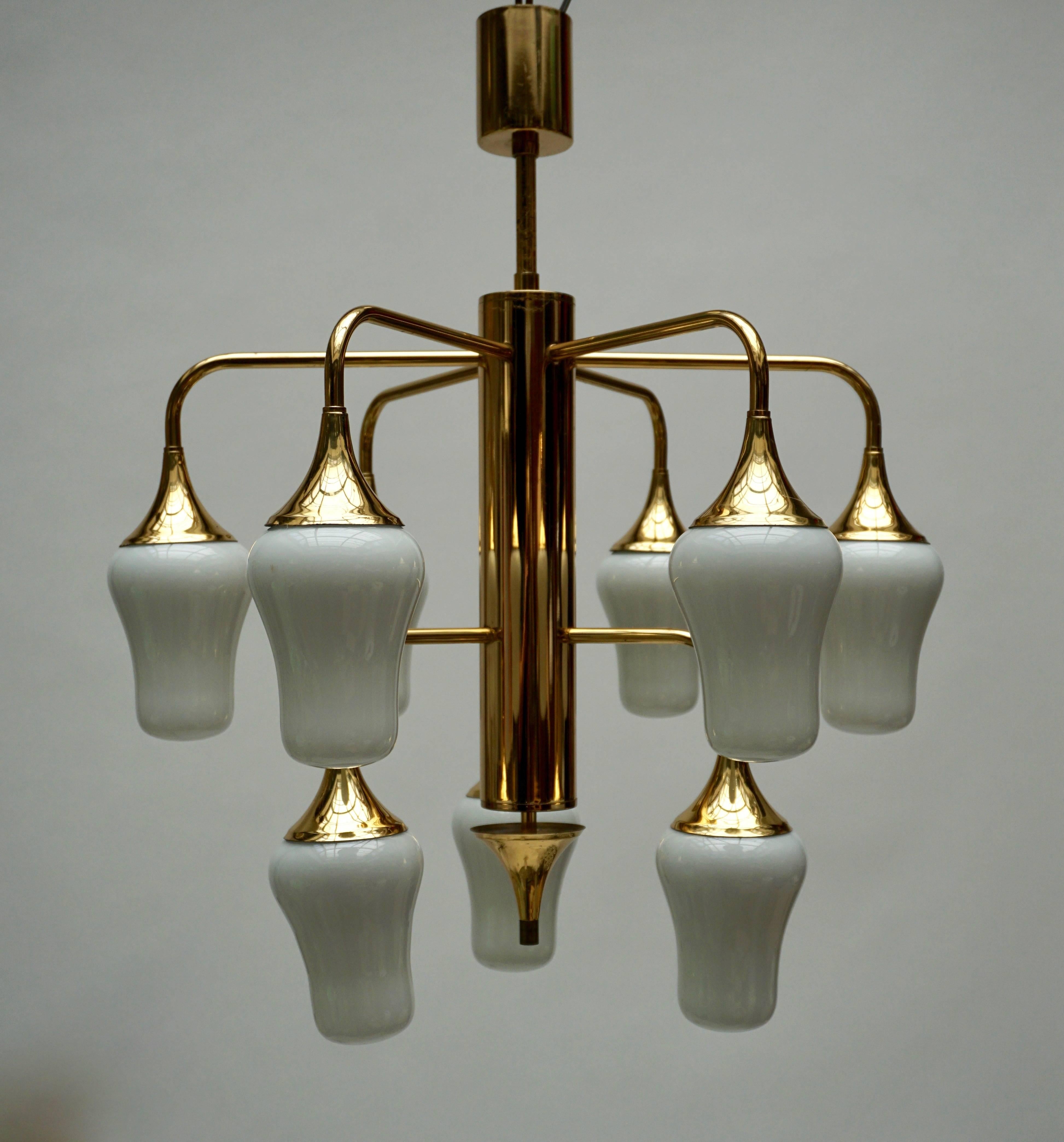 Italian glass and brass chandelier.
Measures: Diameter 52 cm.
Height 62 cm.
Nine E14 bulbs.