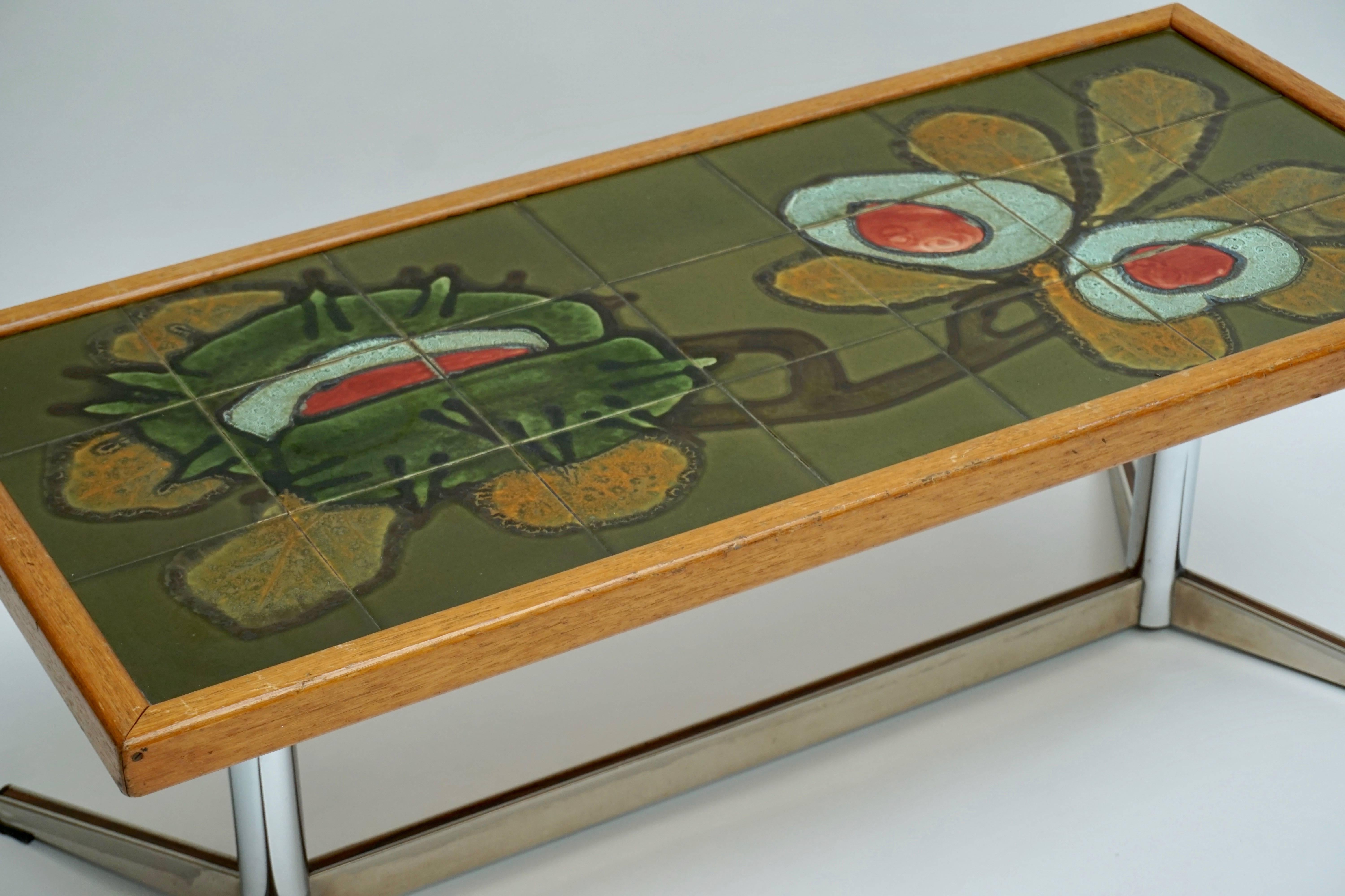 Ceramic tile coffee table, Belgium, 1970s.
Height:42 cm.
Width:110 cm.
Depth:49 cm.
  