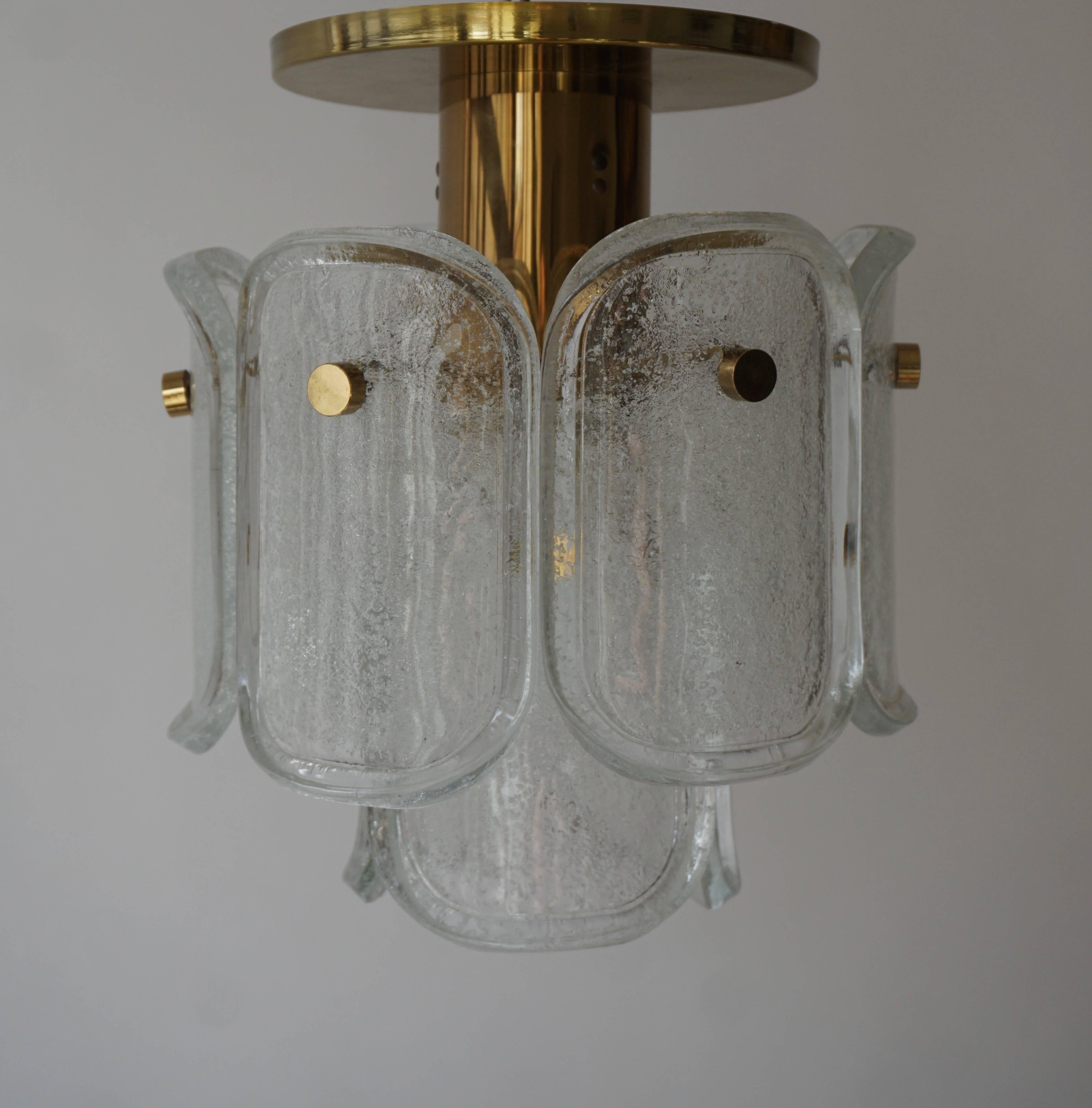 A very exquisit 24-carat gold-plated brass and clear brillant glass 'Palazzo' flush mount light by J.T. Kalmar, Vienna, Austria, manufactured in circa 1970 (late 1960s and early 1970s).
This light are handmade and high quality pieces. Large