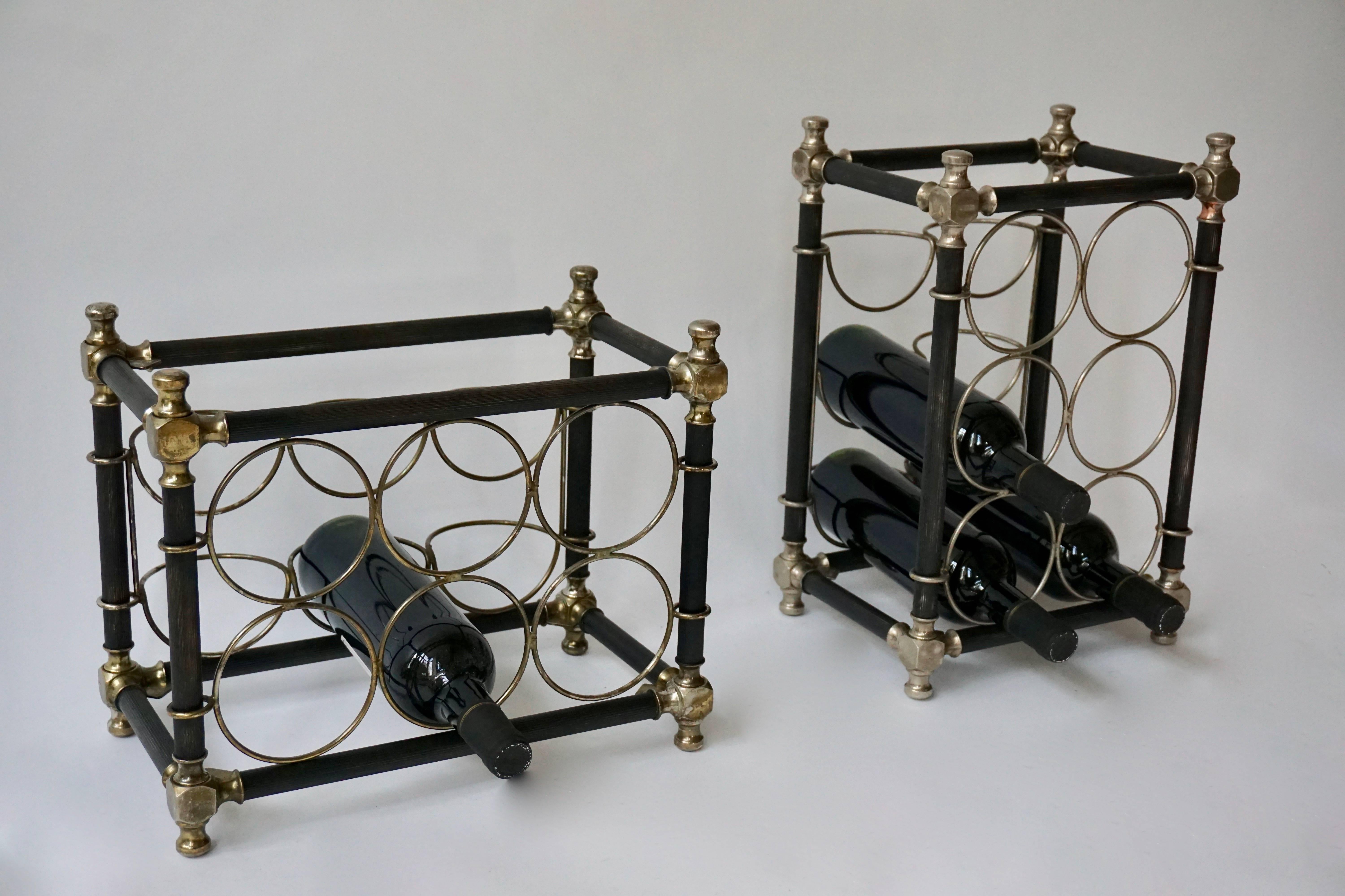 Two small brass wine racks suitable for counter top made for six bottles.
Italy, 1970s.
Measures: Height 41 cm, width 27 cm, depth 21 cm.
Height 31 cm, width 37 cm, depth 21 cm.
  