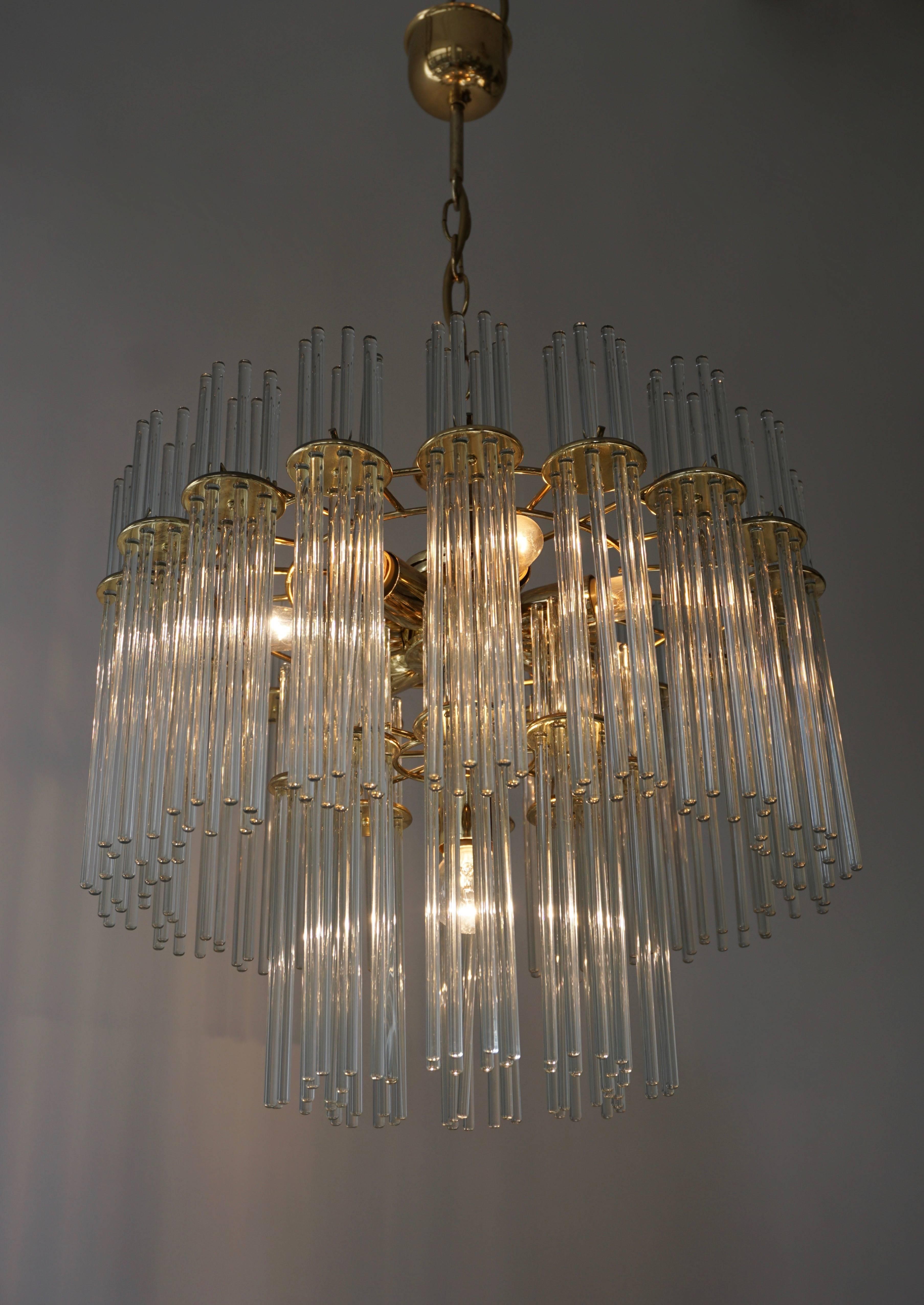 Italian Murano glass and brass chandelier.
Measures: Diameter:42 cm.
Height fixture 42 cm.
Total height with the chain:75 cm.
