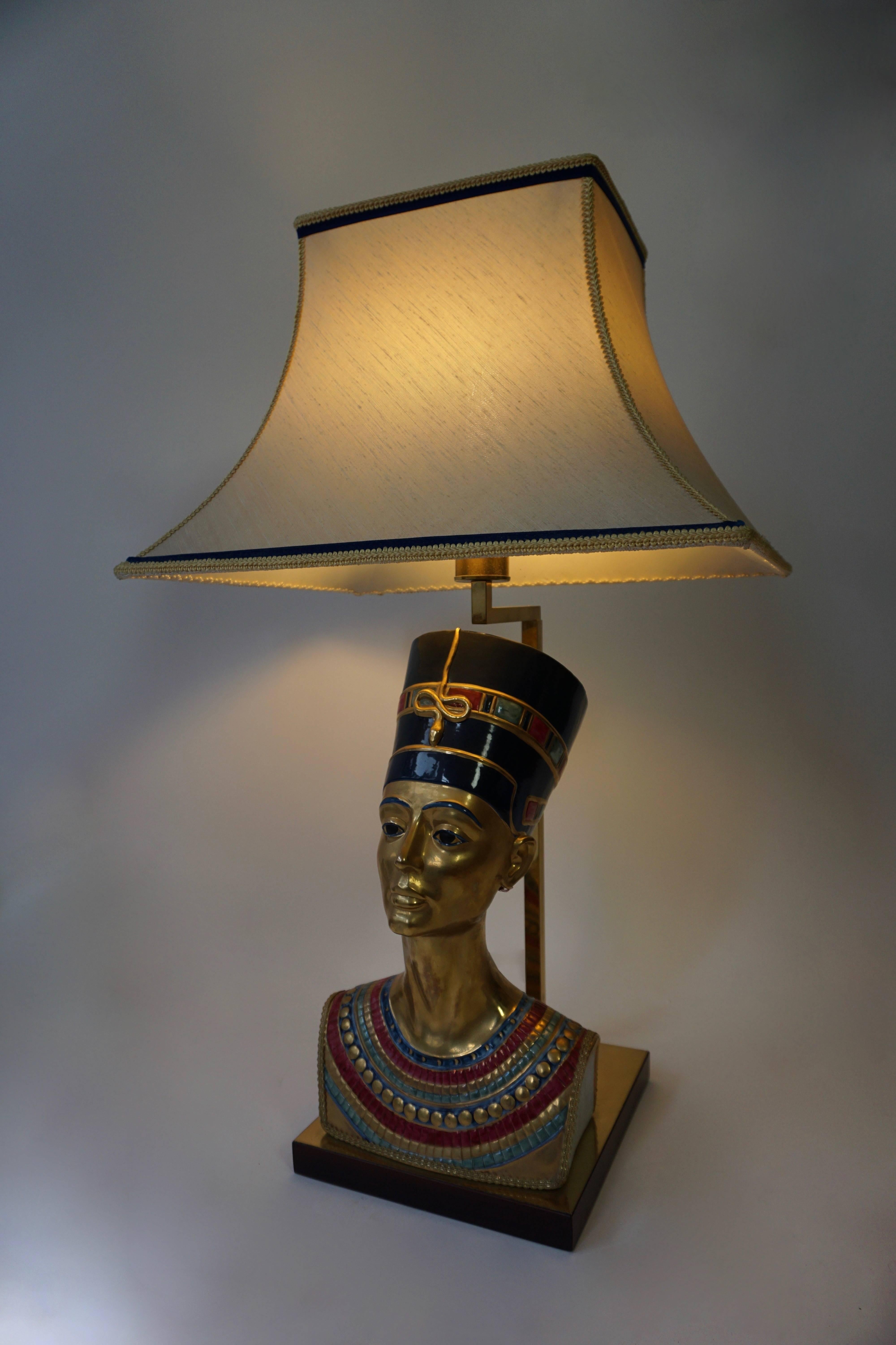 Stunning Italian porcelain table lamps depicting Egyptian Queen Nefertiti. Amazing detailed chiseled features, jewels and head piece's, wonderful patina.
Signed Edoardo Tasca.
Height:86 cm.
Width:51 cm.
Depth:41 cm.