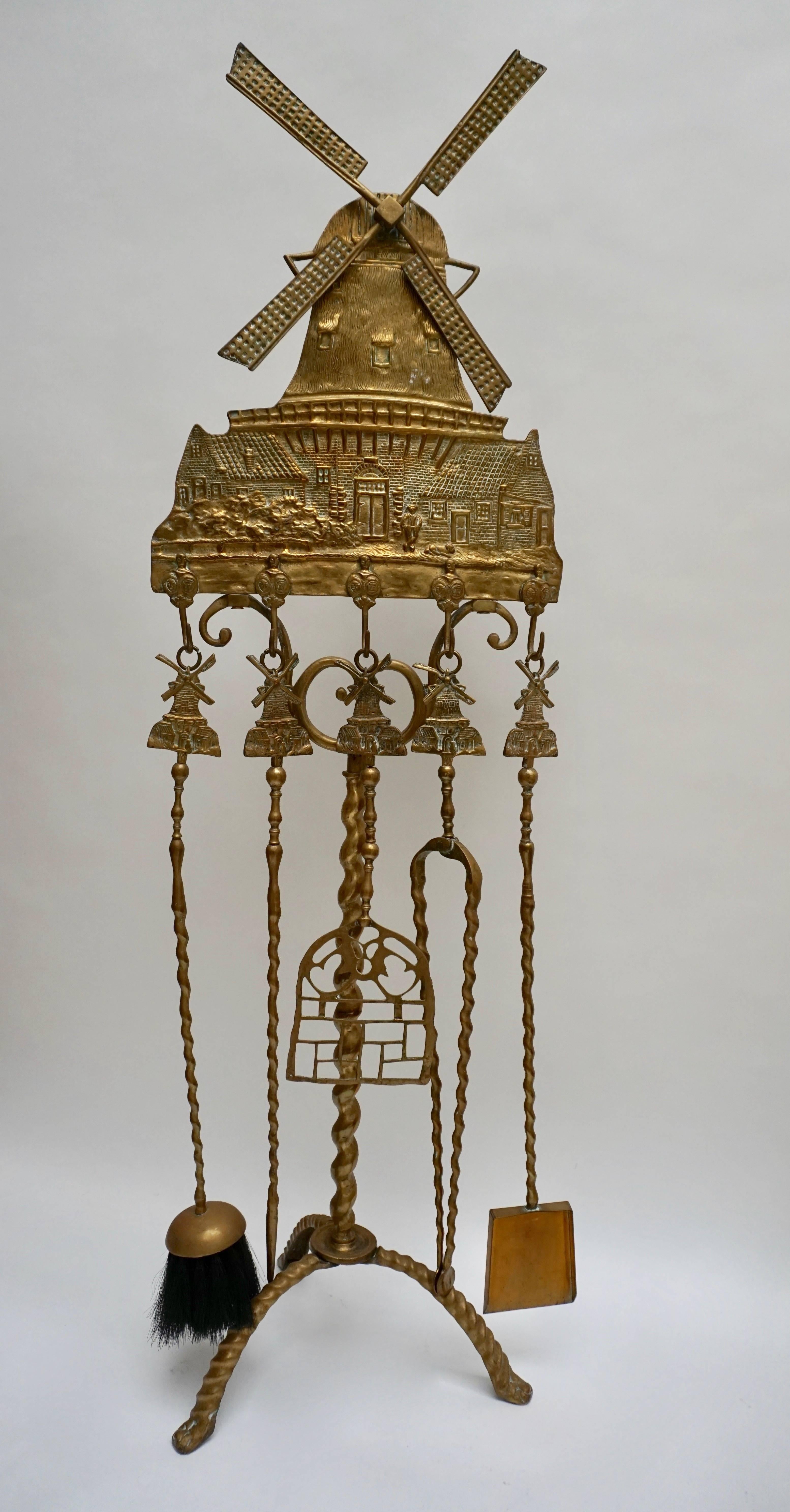 Rare brass fireplace tools with Dutch windmills, 
Holland, early 19th century.
Measures: height: 128 cm.
Width:40 cm.