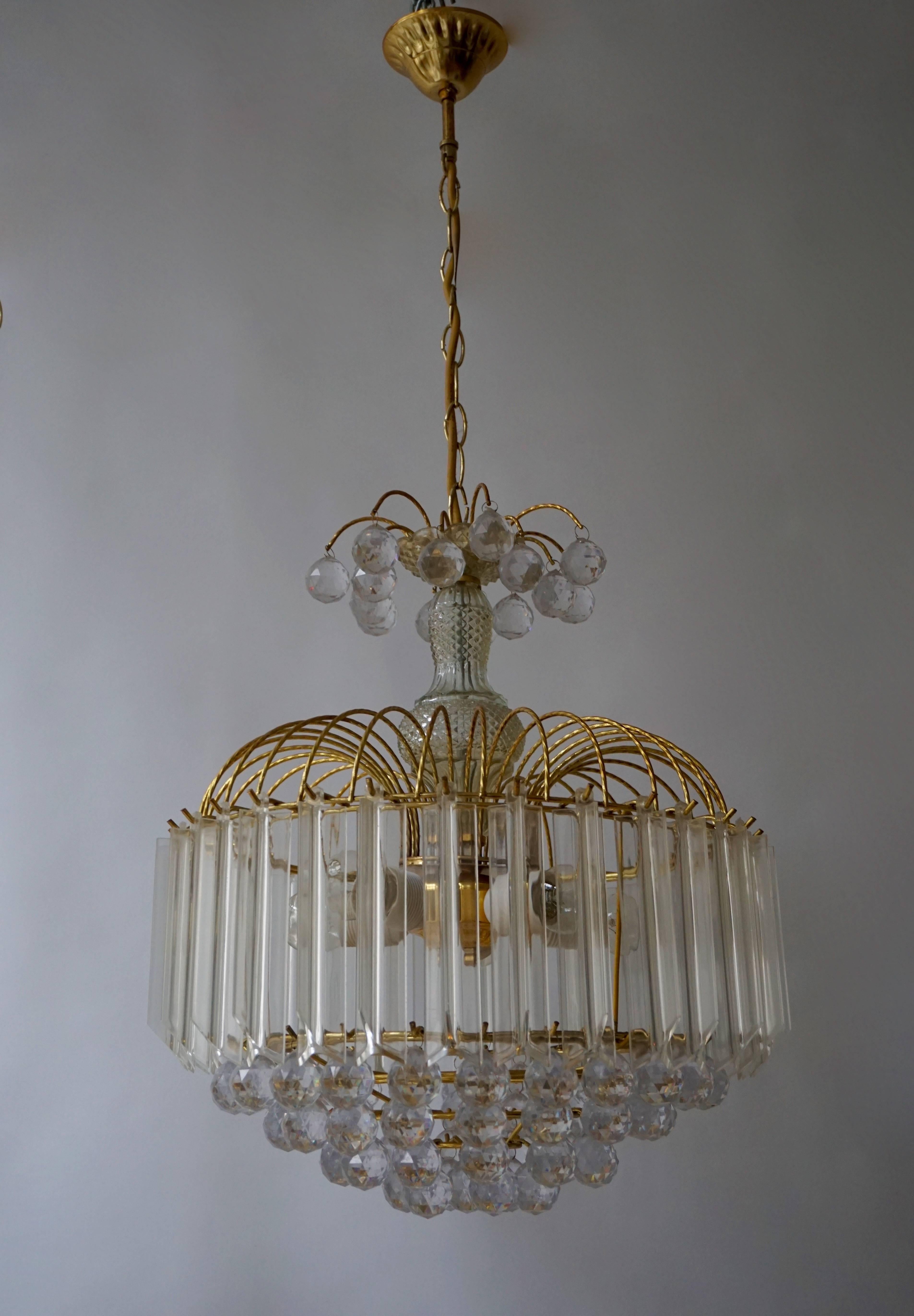 Two Italian chandeliers.

Diameter 40 cm.
Height fixture 48 cm.