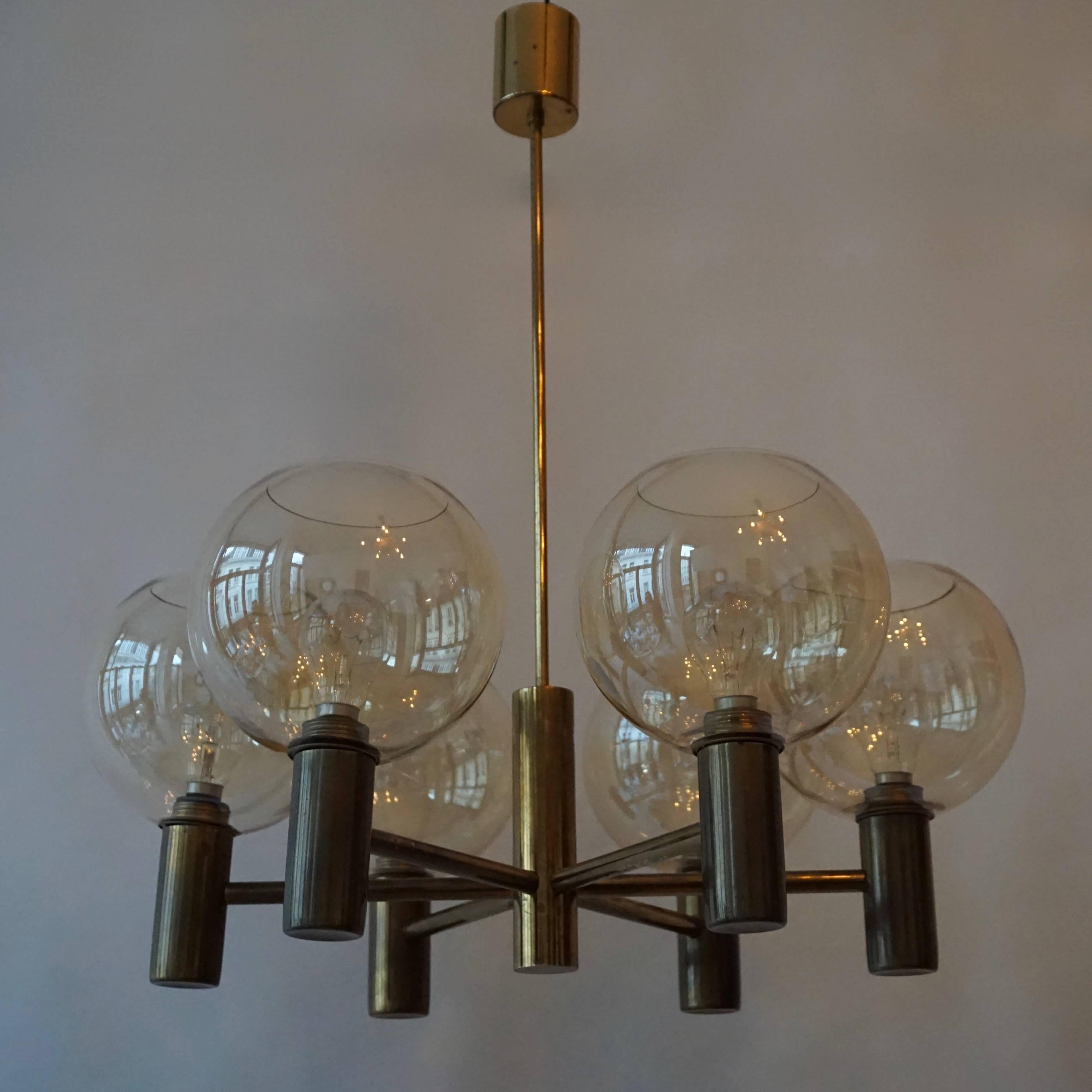 One Superb chandelier by Hans Agne Jakobsson.
Six arms, original smoke glass shades.
In working condition.
60 watts max per bulb.
A glass shade was broken from 1 chandelier.
So there is only 1 chandelier available for sale.