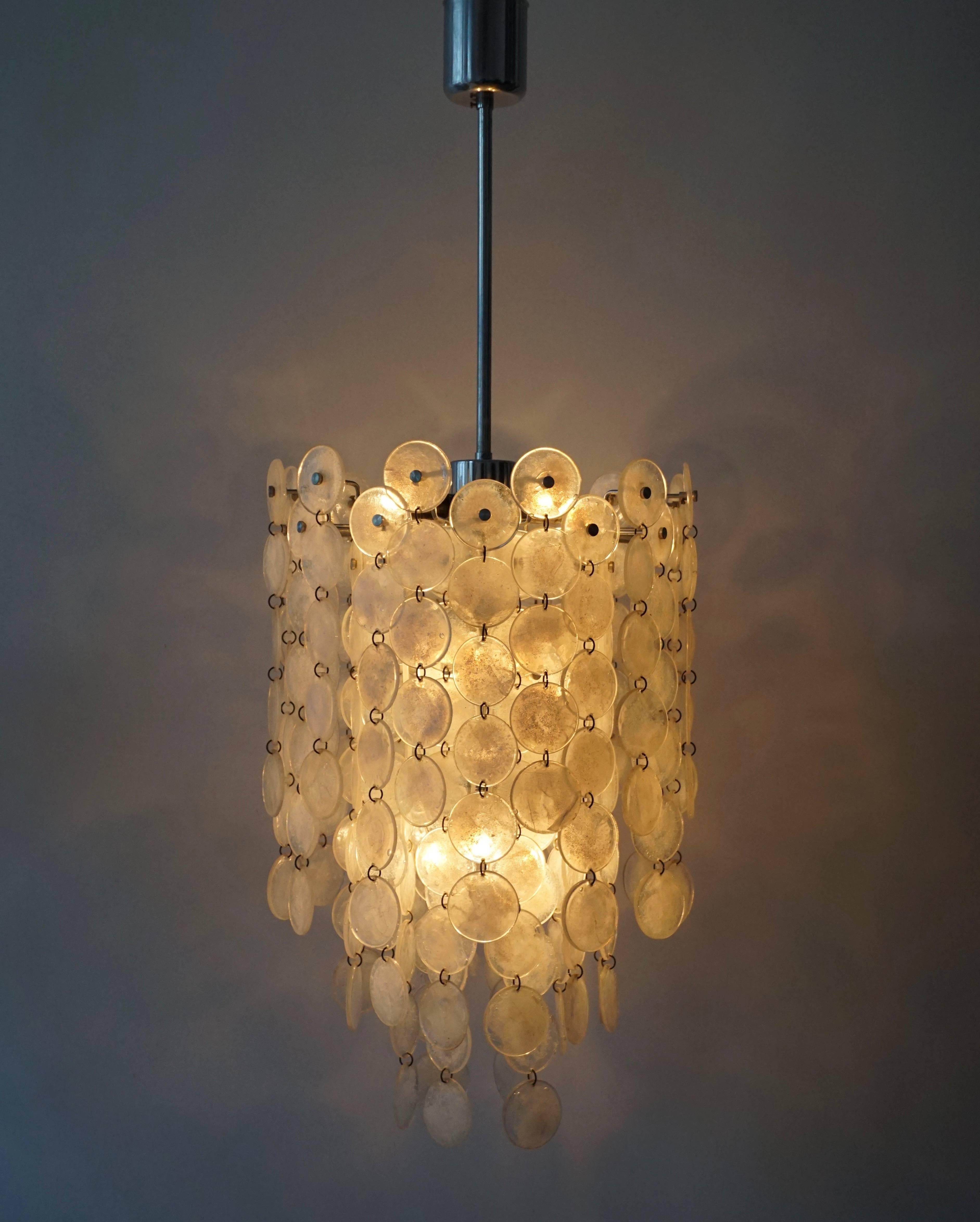 Italian Murano glass chandelier.
The light requires ten single E14 screw fit lightbulbs (40Watt max.) LED compatible.

Measures: 
Total height 110 cm.
Diameter 38 cm.
Height of the lamp without the grid is 60 cm.