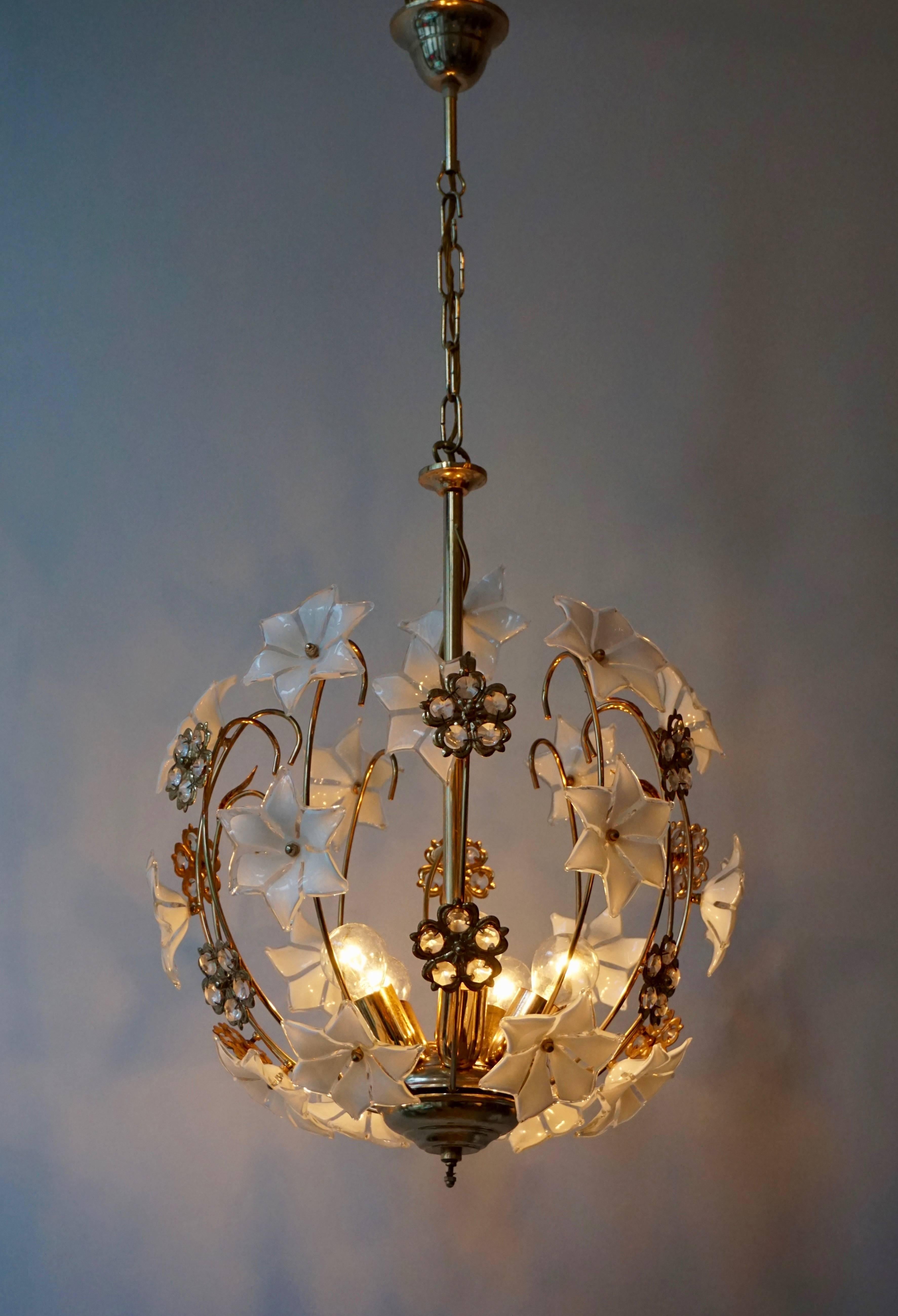 This beautiful chandelier Murano glass flowers was produced in the 1970s in Italy.
Measures: Total height with the chain is 85 cm.
 