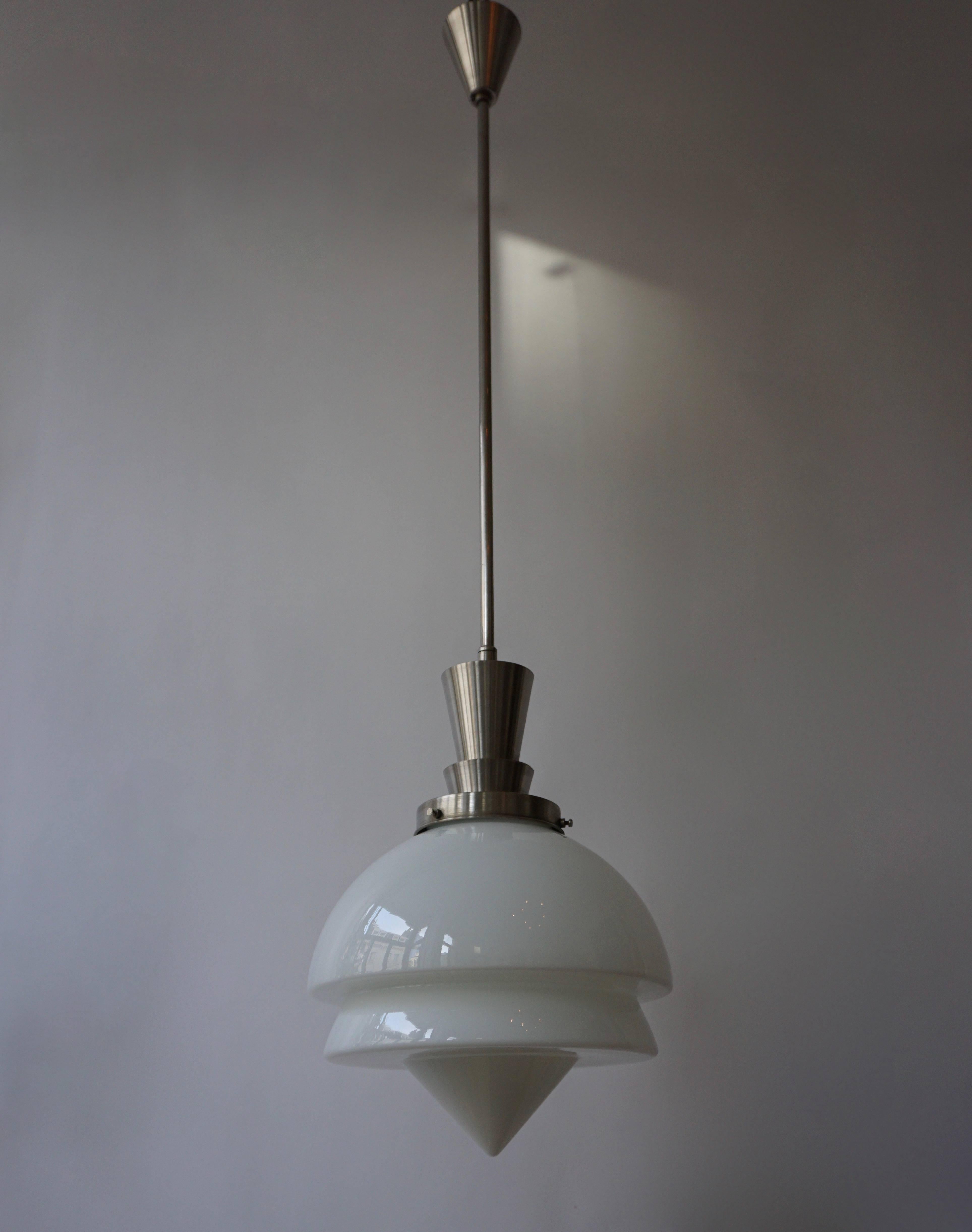 Opaline glass pendant light by Gispen, Holland.