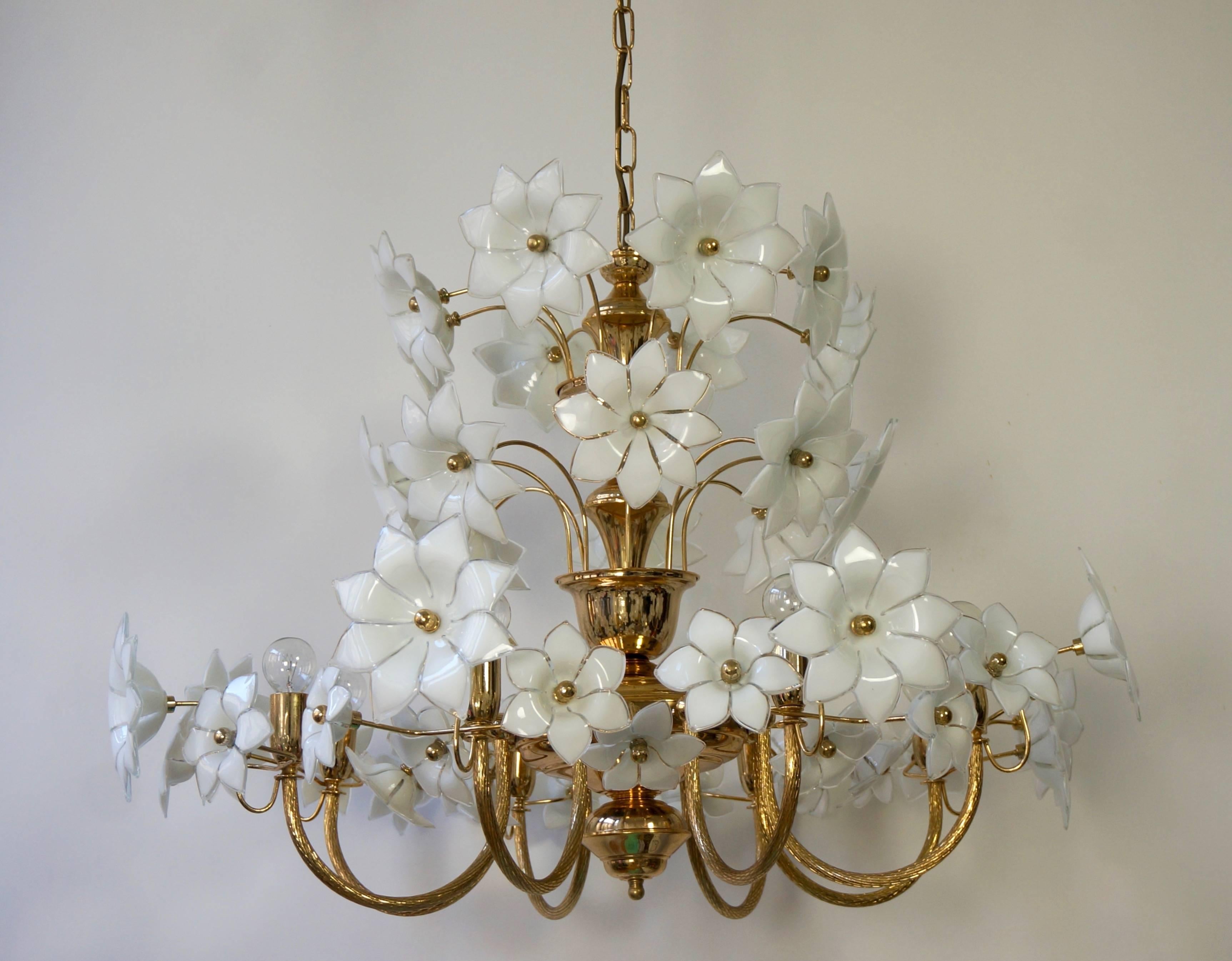 Very glamorous and large flower chandelier with 48 large flowers in two different sizes. Gold plated brass stunning chandelier with eight bulbs illuminating the wonderful gold and glass flowers. Total height with the chain is 110 cm. Diameter is 90