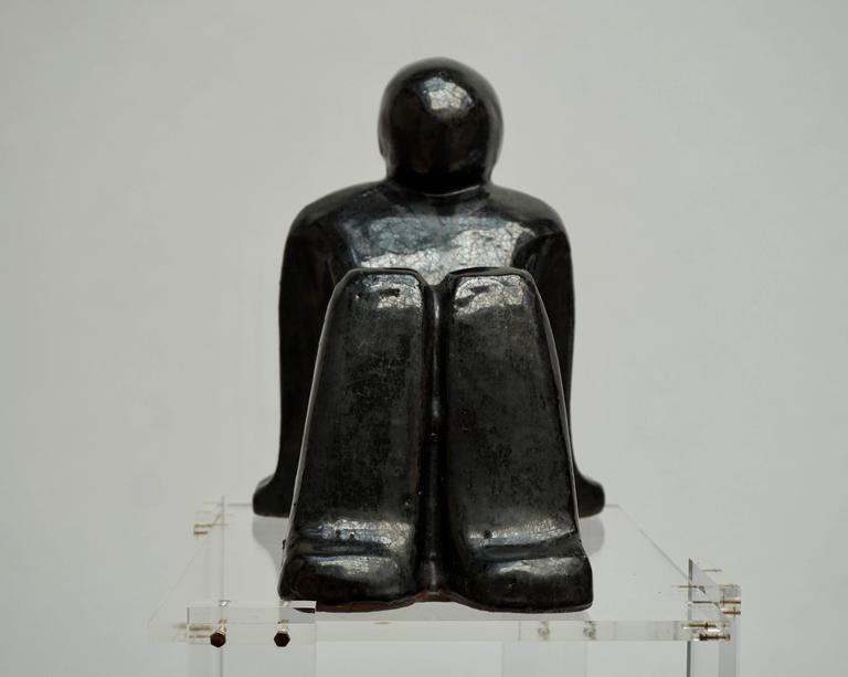 Terracotta sculpture of a sitting man.
Signed.
Measures: Height 31 cm.
Width 25 cm.
Depth 28 cm.
