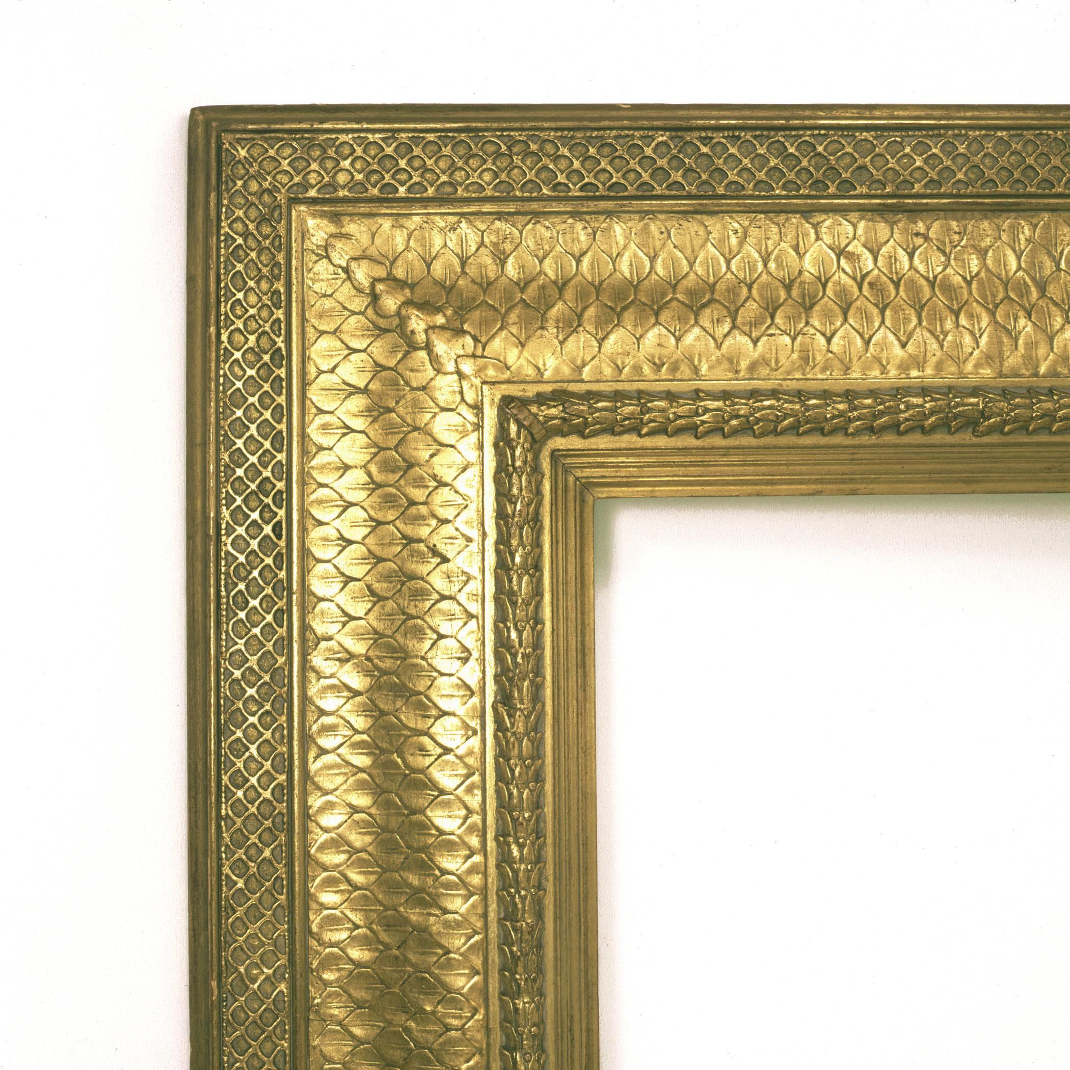 Original period frames designed by the pre-eminent American architect Stanford white are extremely rare and large ones of aesthetic design with original gilding are rarer yet. With its cast openwork outer diaper border and its symmetrically arranged