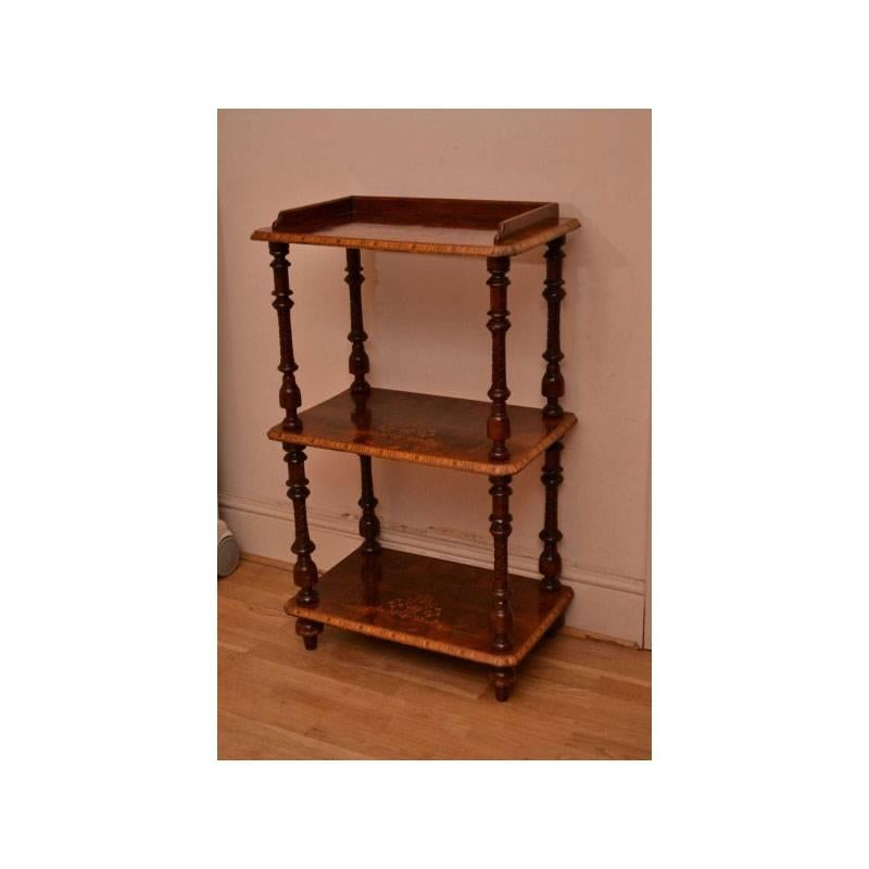There is no mistaking the unique quality and elegant design of this Victorian whatnot, circa 1880.

This stunning stand will create a sense of style and class in your home that only comes with high quality antique furniture pieces such as