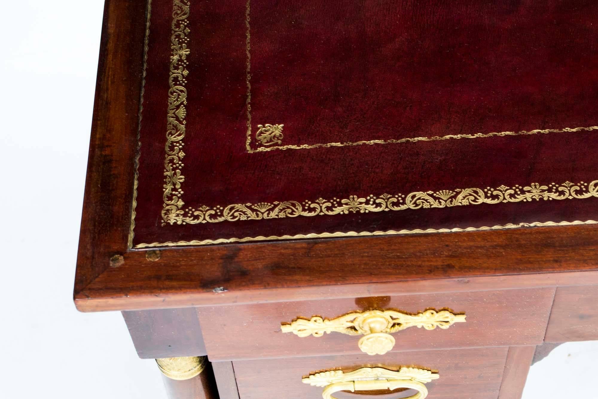 We are pleased to offer for sale this very elegant Antique Empire Ormolu Desk which has been made in the Louise Philippe Style and which dates from around 1880.

This antique French desk is made in the classical Empire style from solid mahogany and
