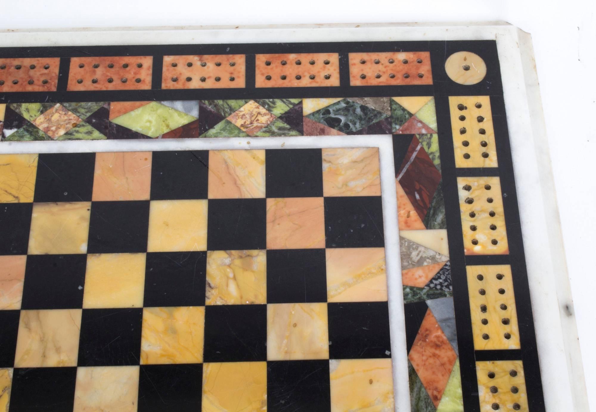 This is a wonderful antique specimen marble table top inset with chess and cribbage boards, circa 1800 in date.

Very decorative and inset with many beautiful and varied types of marble.


Condition:
Excellent - original and untouched.